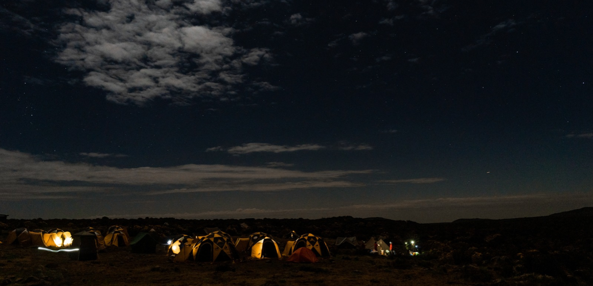 Campsite-on-Kilimanjaro-lit-by-a-full-moon---The-Adventure-People.png