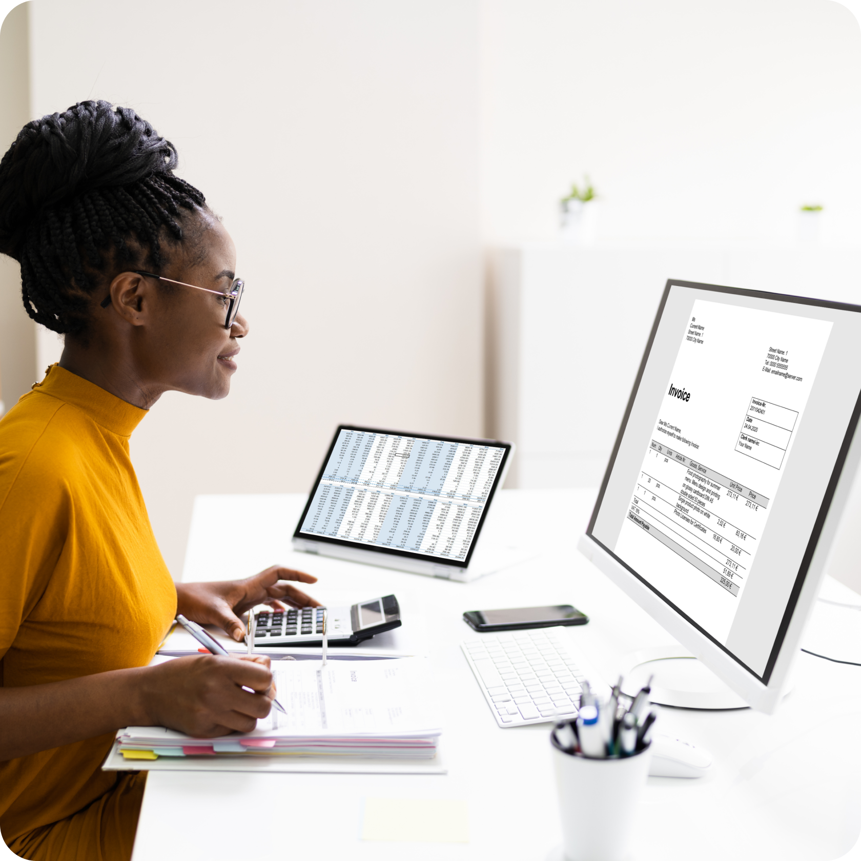 Person using silo's software at a desk with two monitors