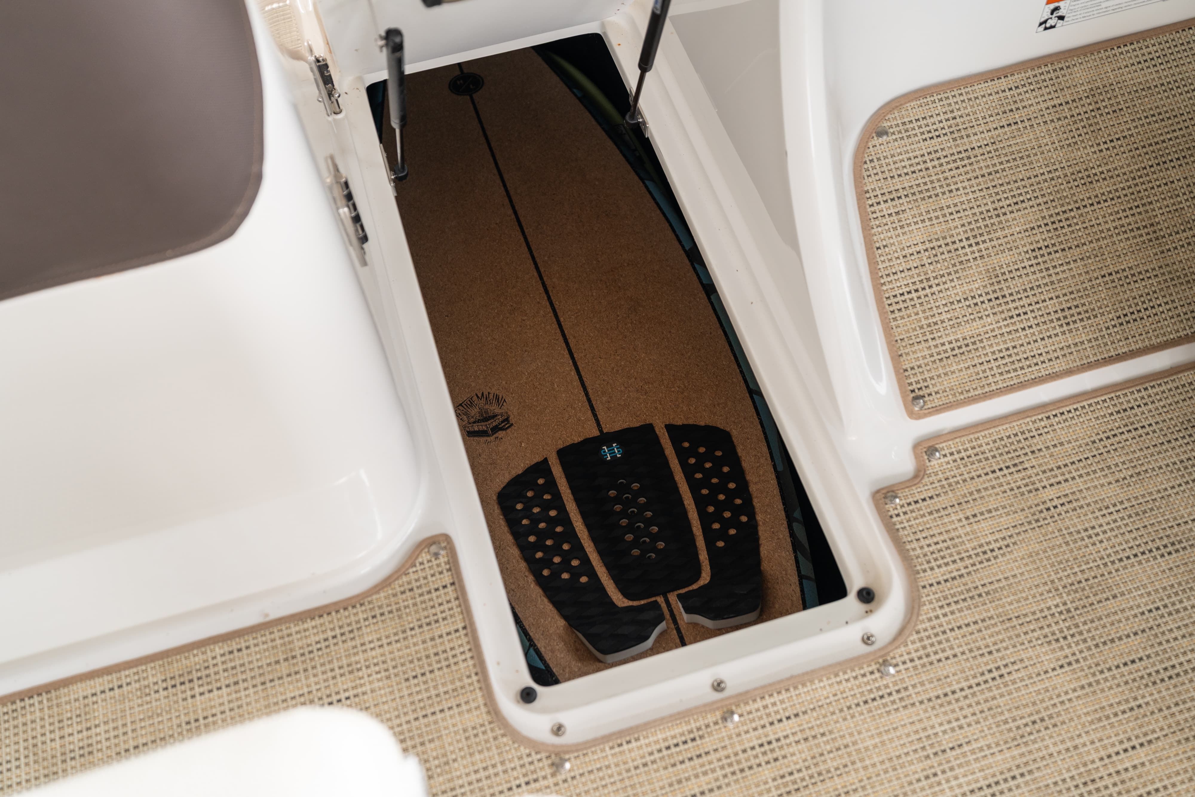 Wakeboard storage in a 2018 Cobalt R7 Surf boat in Lakeway, TX.