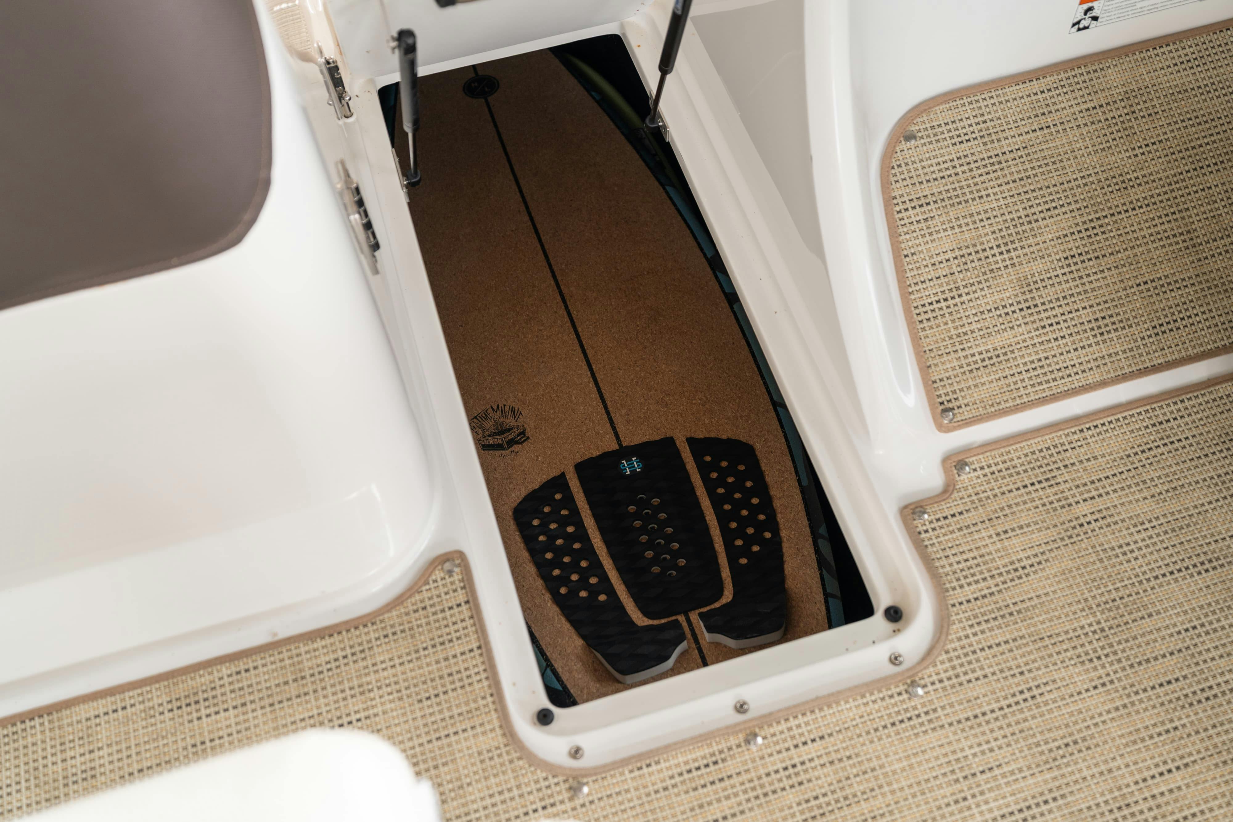 Wakeboard storage in a 2018 Cobalt R7 Surf boat in Lakeway, TX.