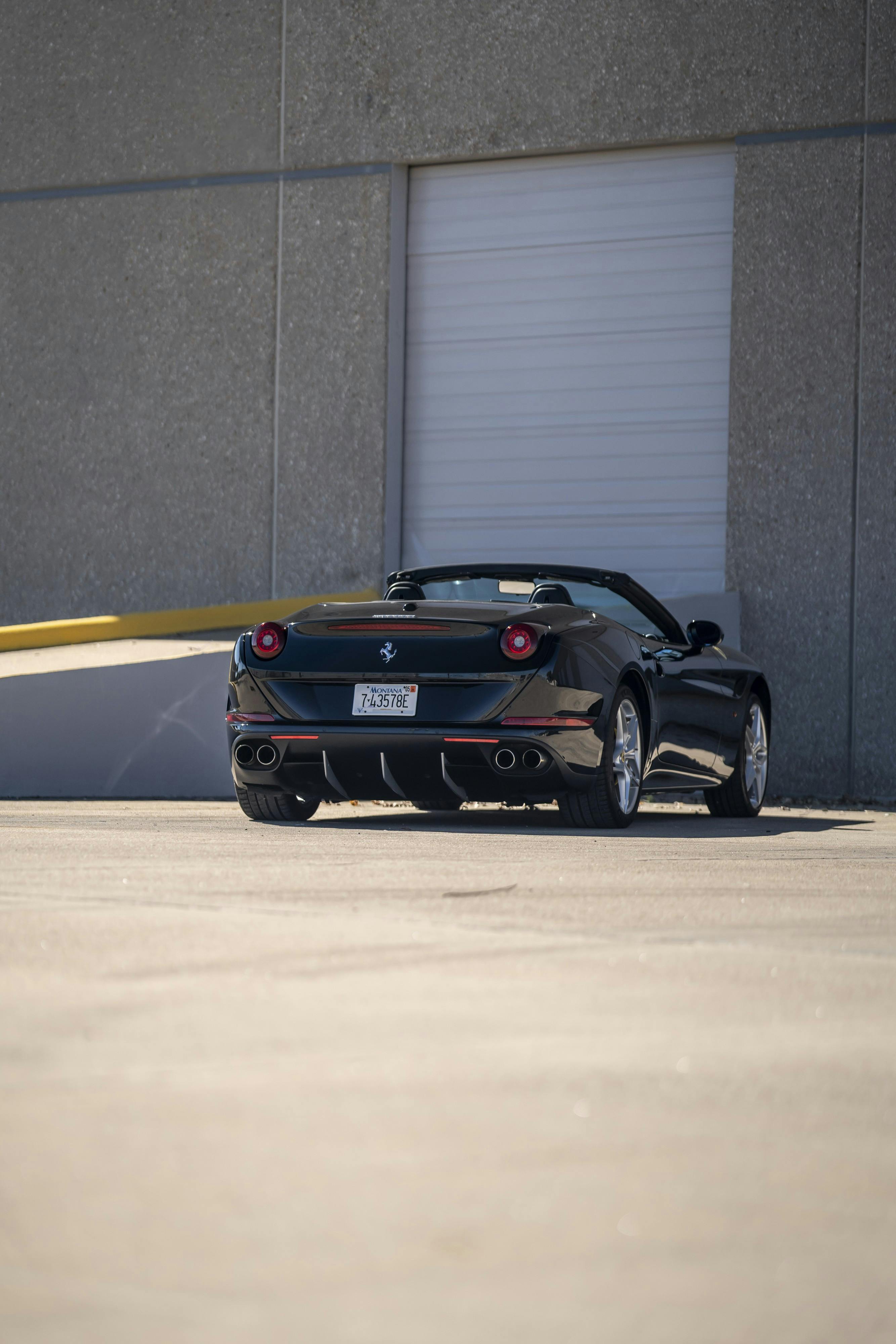 2016 Ferrari California T in black at Petrol Lounge in Austin, TX.