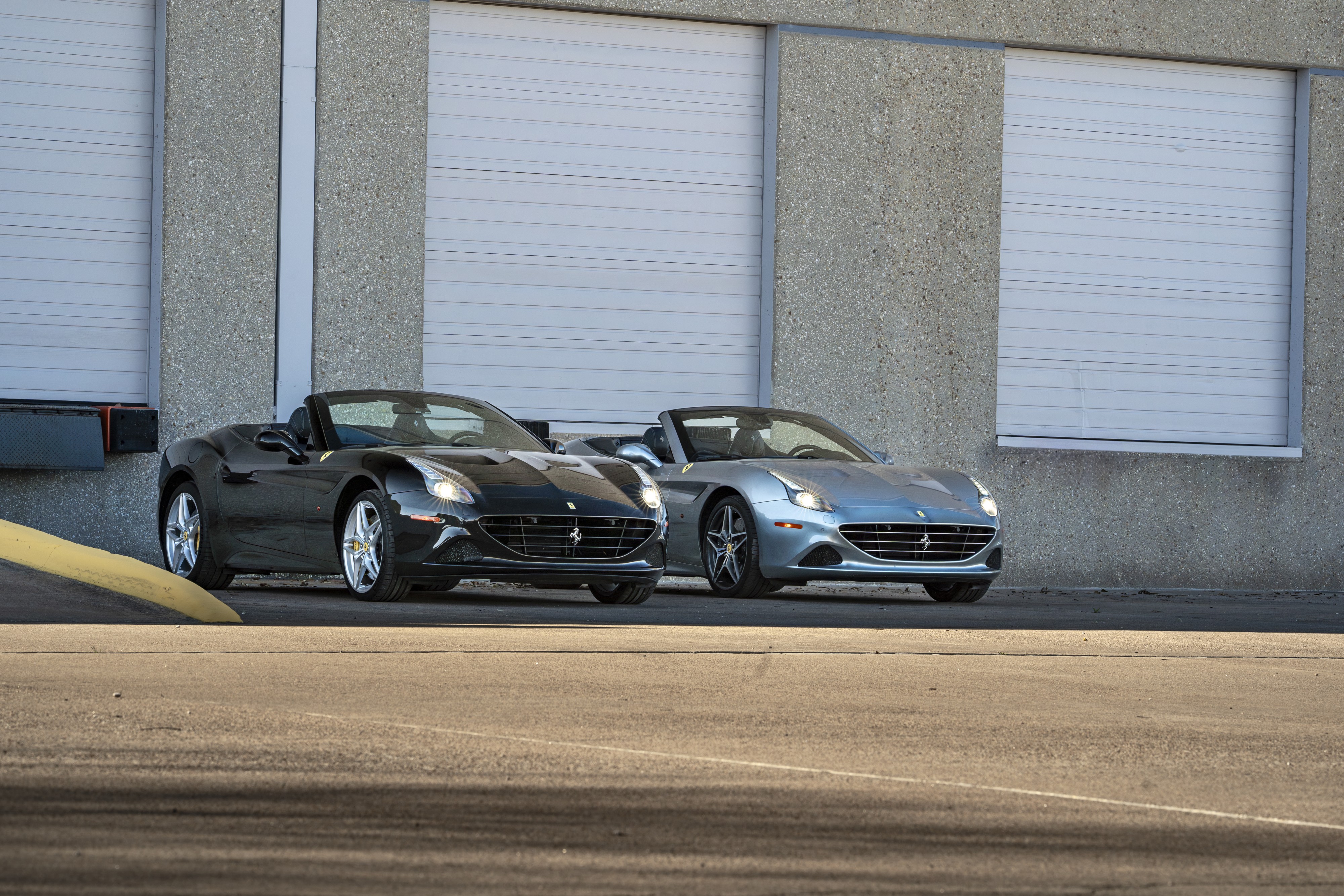 Two 2016 Ferrari California Ts at Petrol Lounge in Austin, TX.