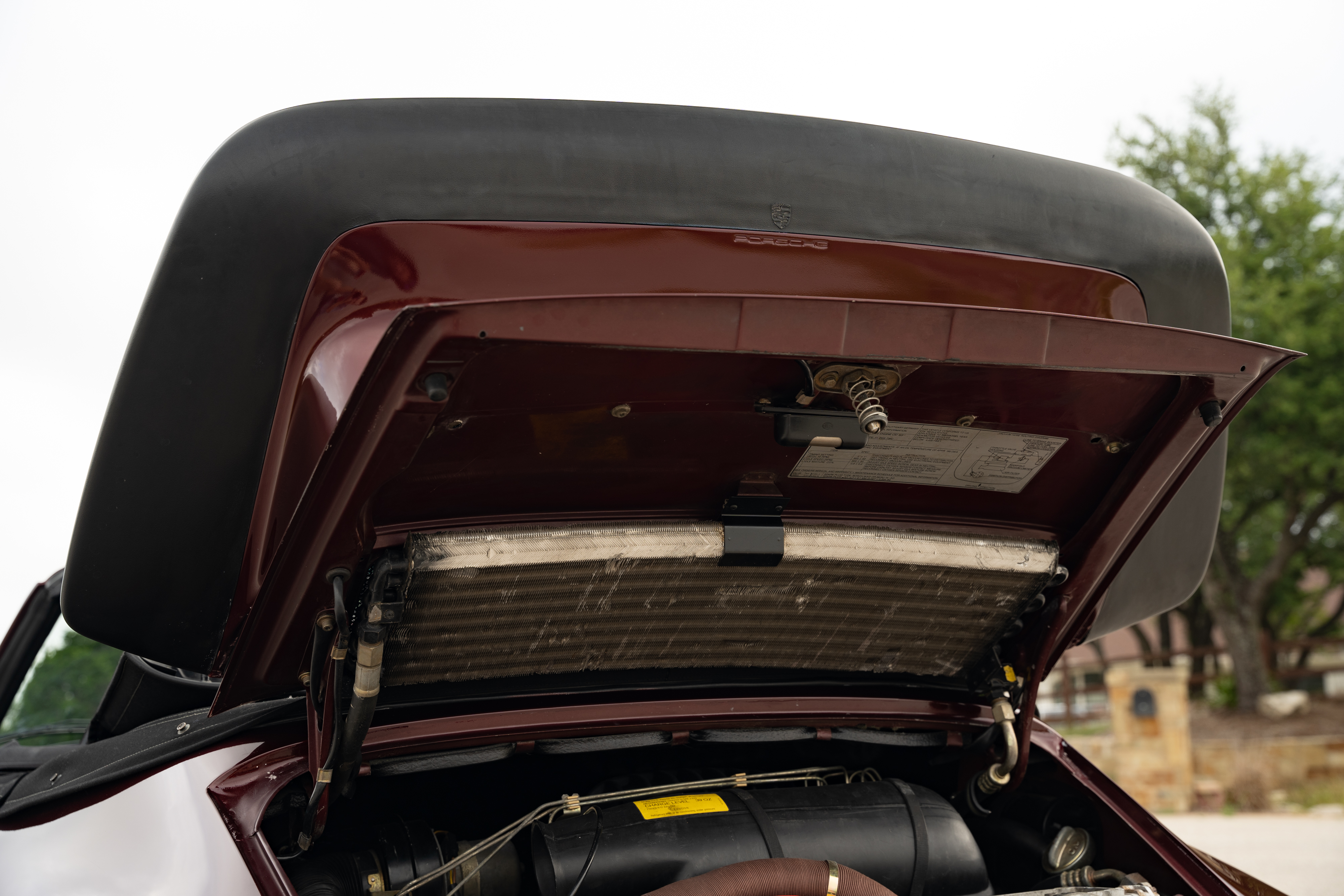 1983 Porsche 911SC Cabriolet in Metallic Red shot in Austin, TX.