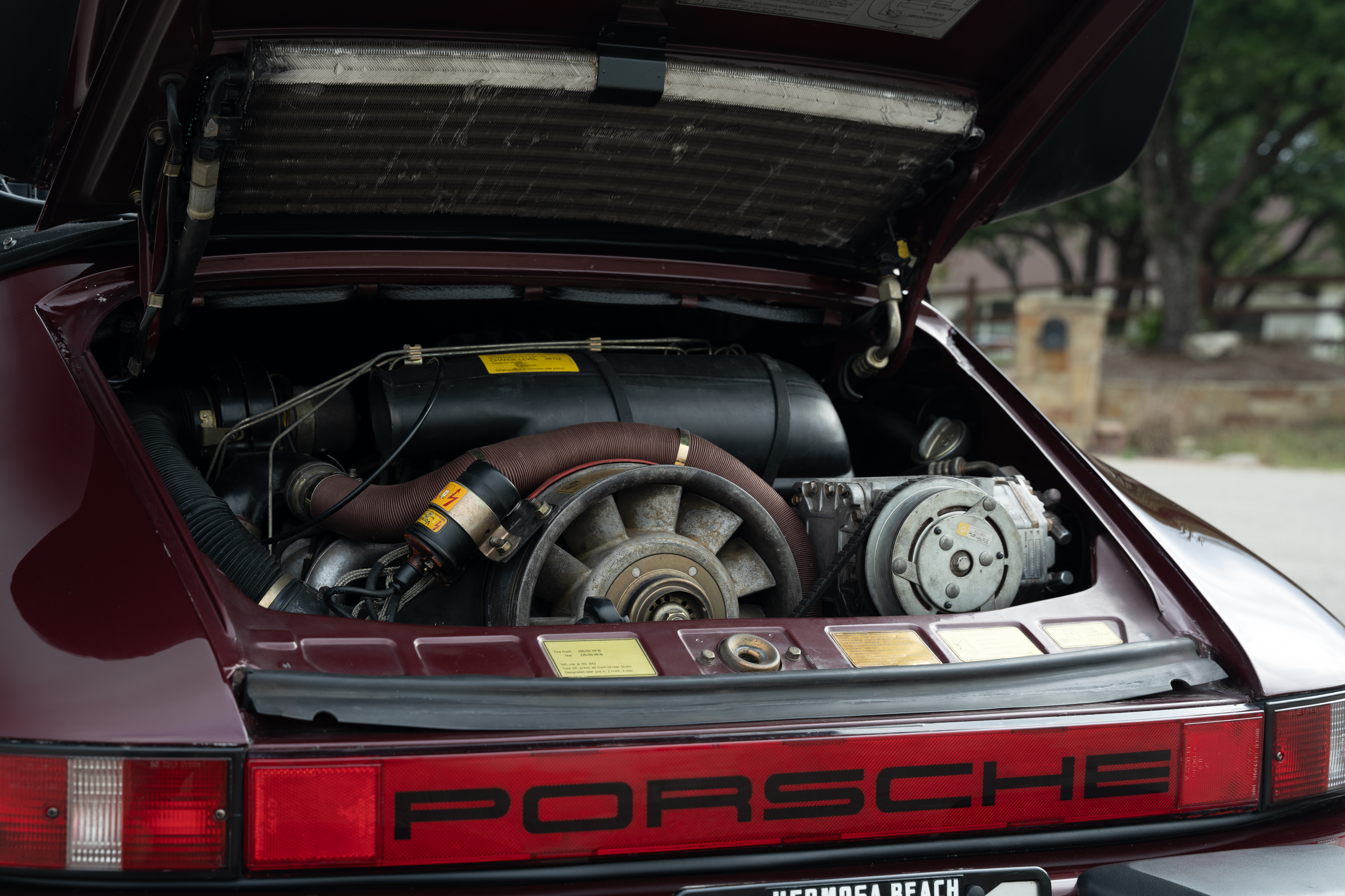 1983 Porsche 911SC Cabriolet in Metallic Red shot in Austin, TX.