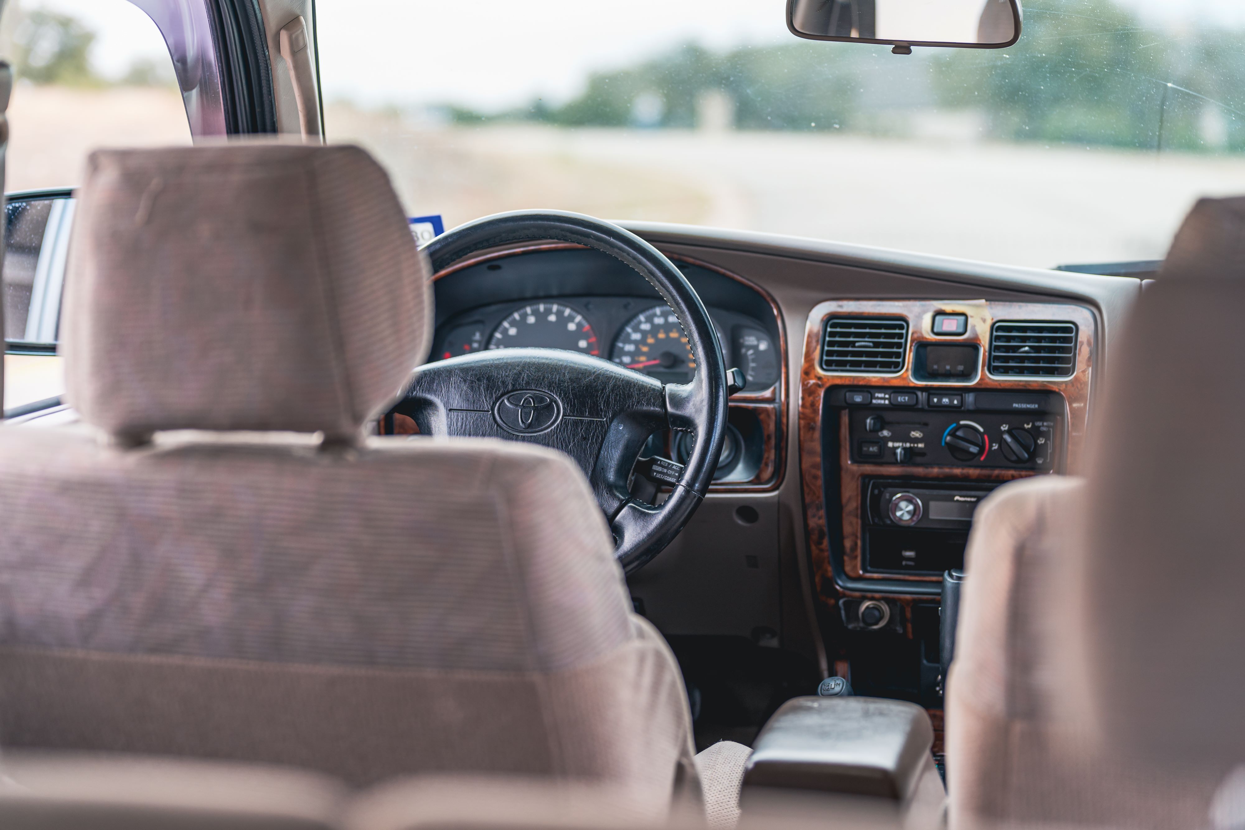 Tan interior of an Imperial Jade Mica 2000 Toyota 4Runner SR5 shot in Austin, TX.