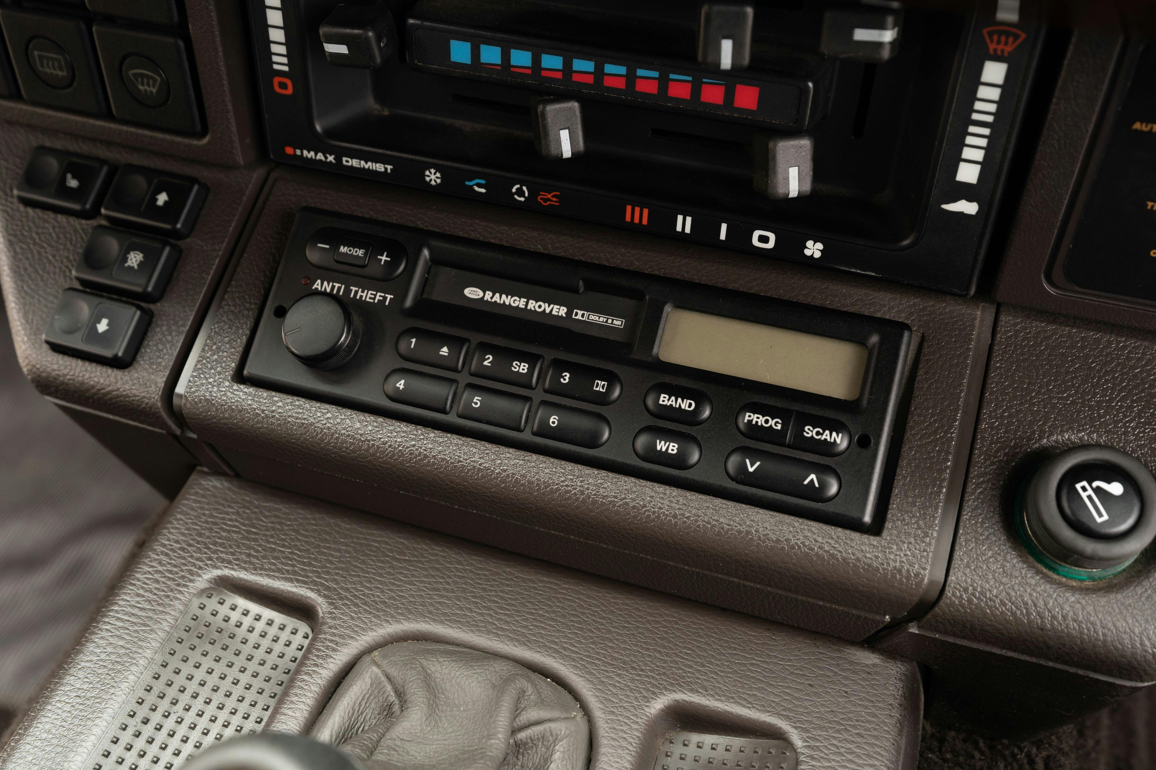 Radio on a 1994 Range Rover LWB in Beluga Black over Dark Sable in Austin, TX.