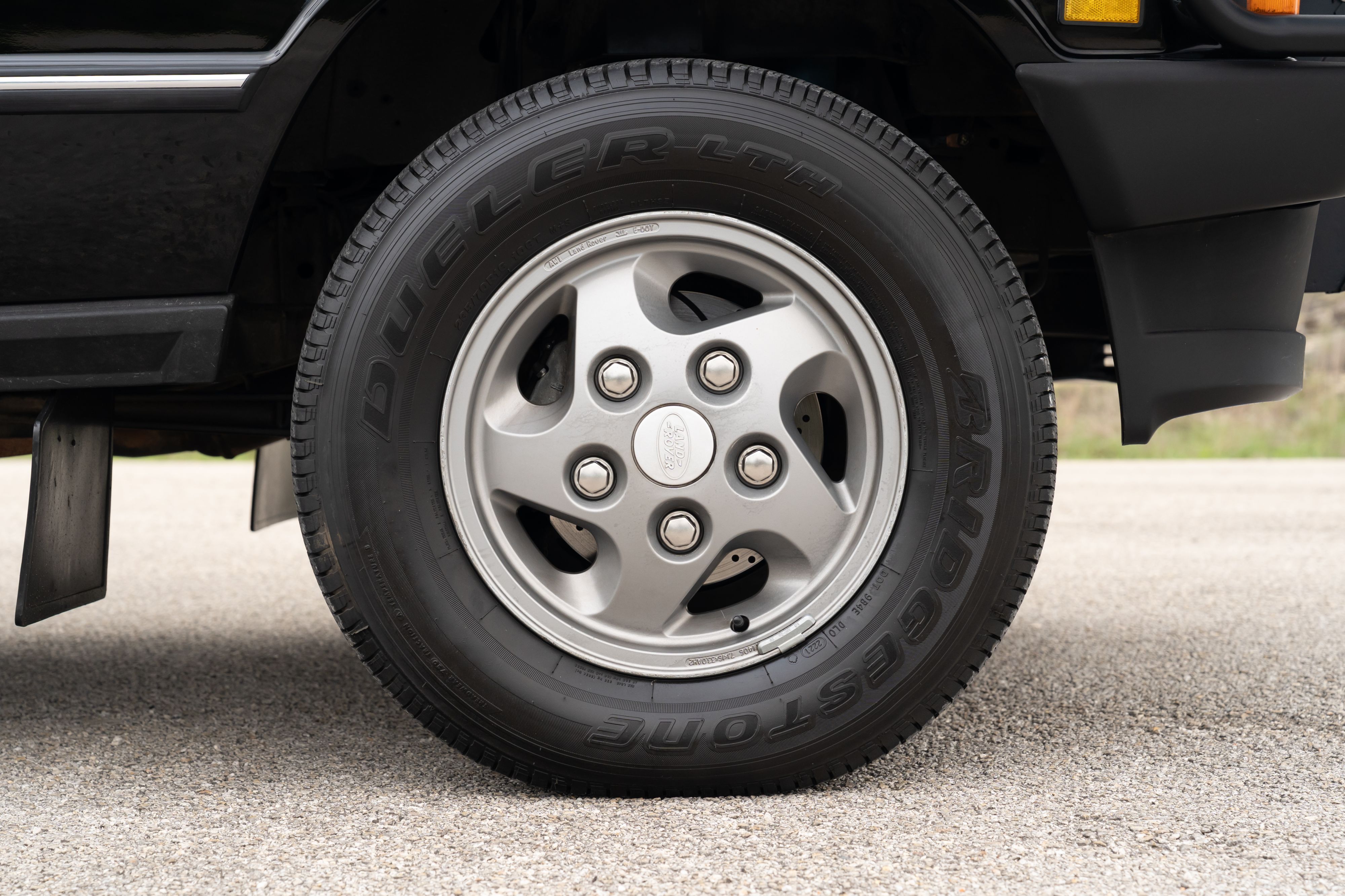 Wheels on a 1994 Range Rover LWB in Beluga Black over Dark Sable in Austin, TX.