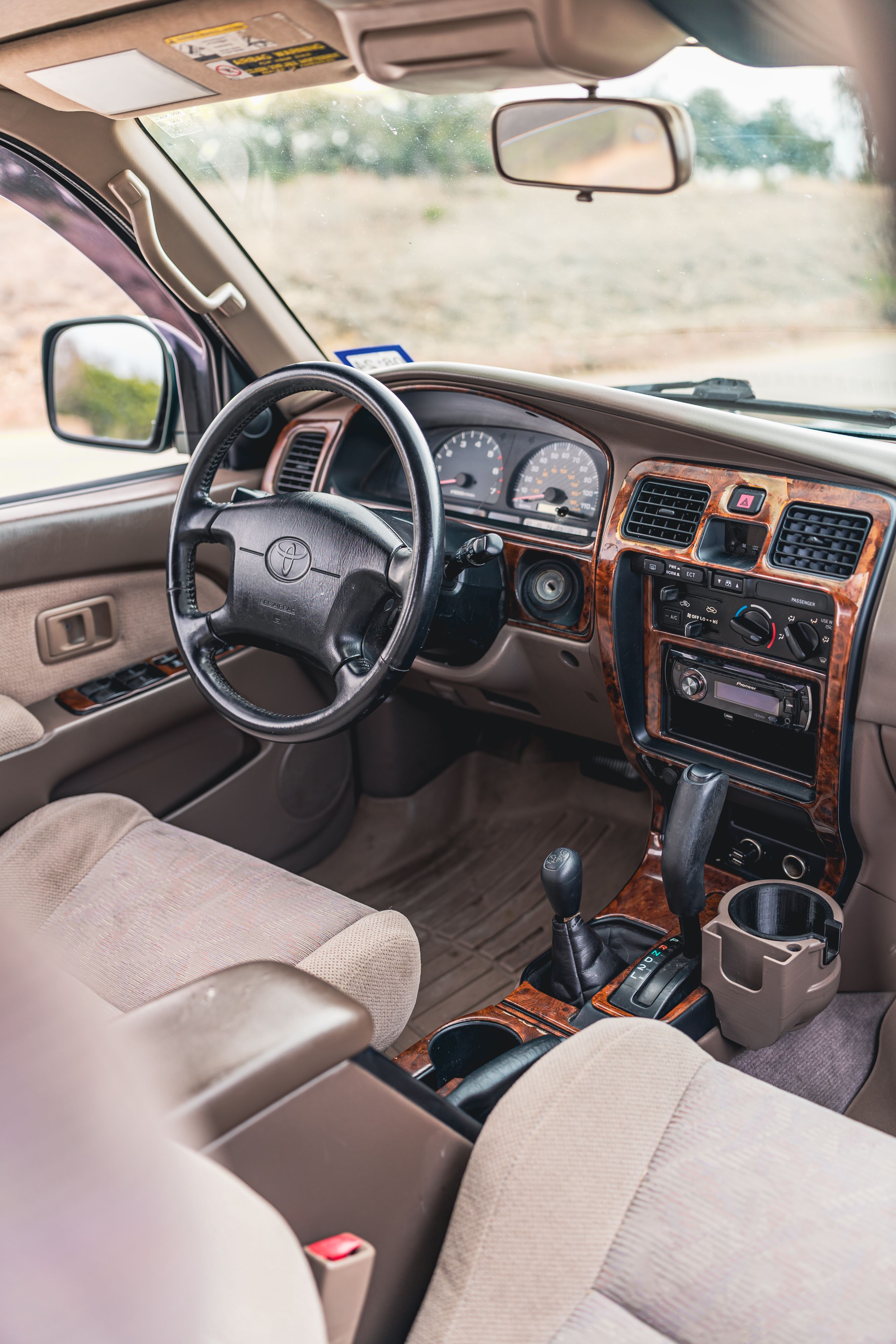 Tan interior of an Imperial Jade Mica 2000 Toyota 4Runner SR5 shot in Austin, TX.