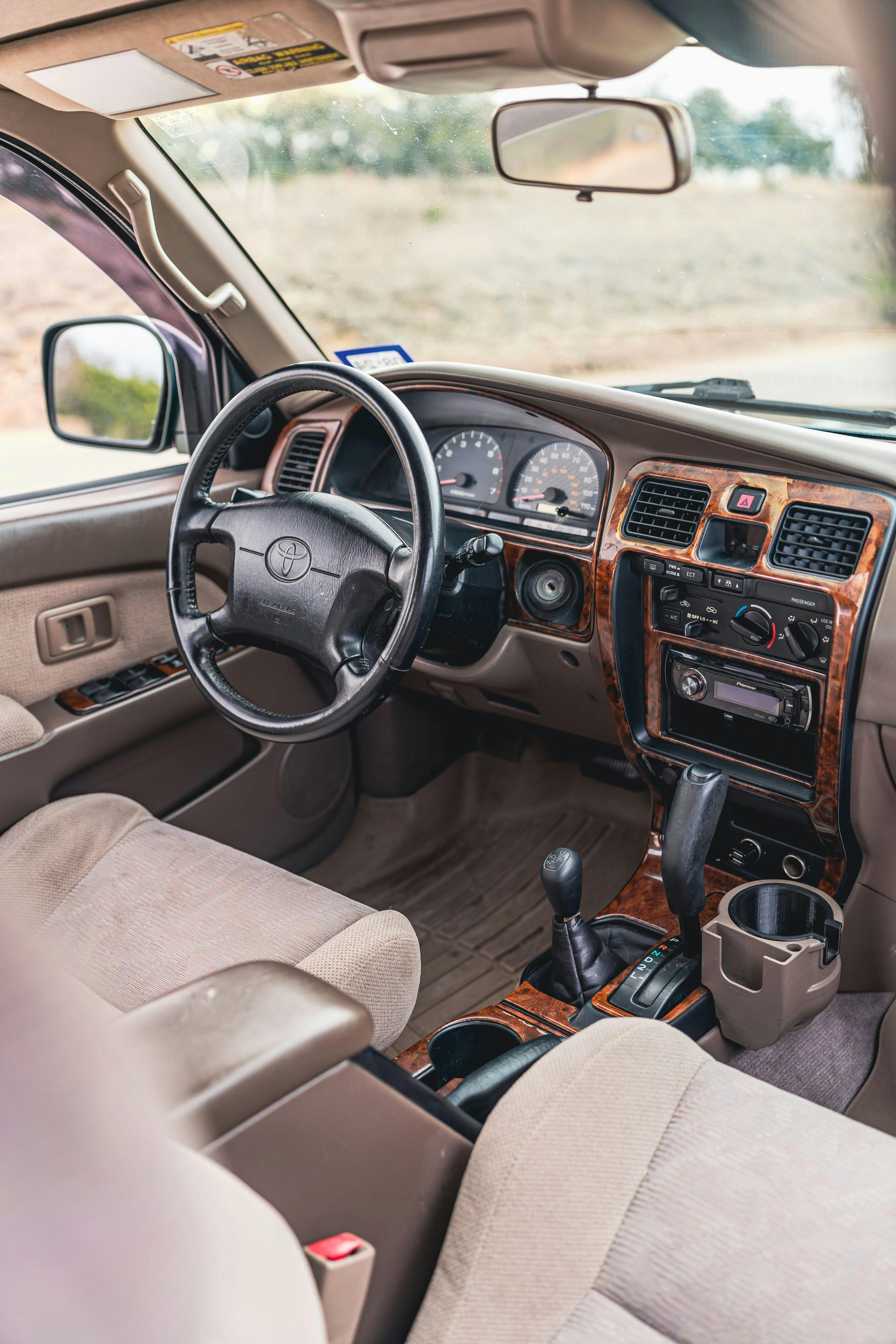 Tan interior of an Imperial Jade Mica 2000 Toyota 4Runner SR5 shot in Austin, TX.