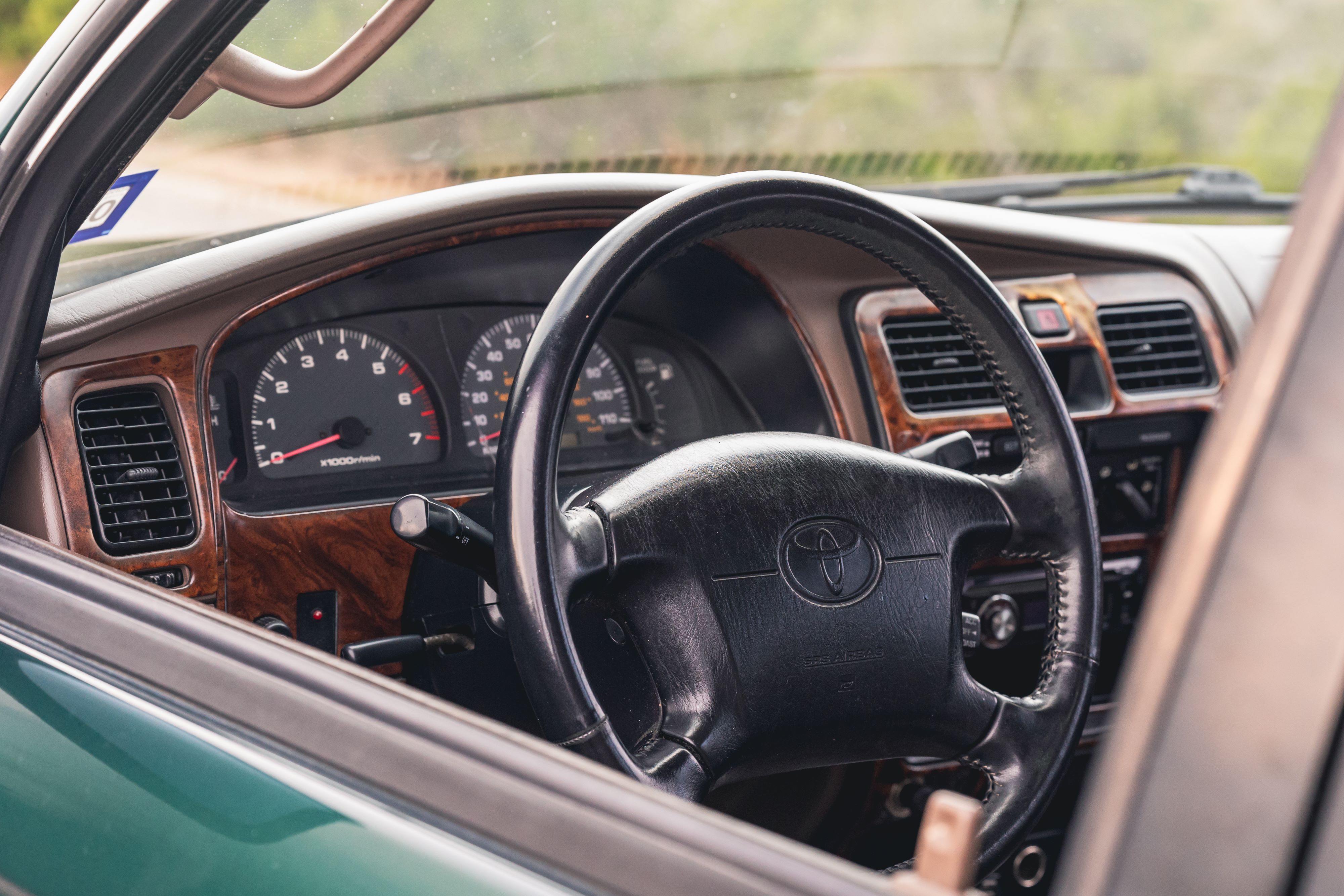 Tan interior of an Imperial Jade Mica 2000 Toyota 4Runner SR5 shot in Austin, TX.