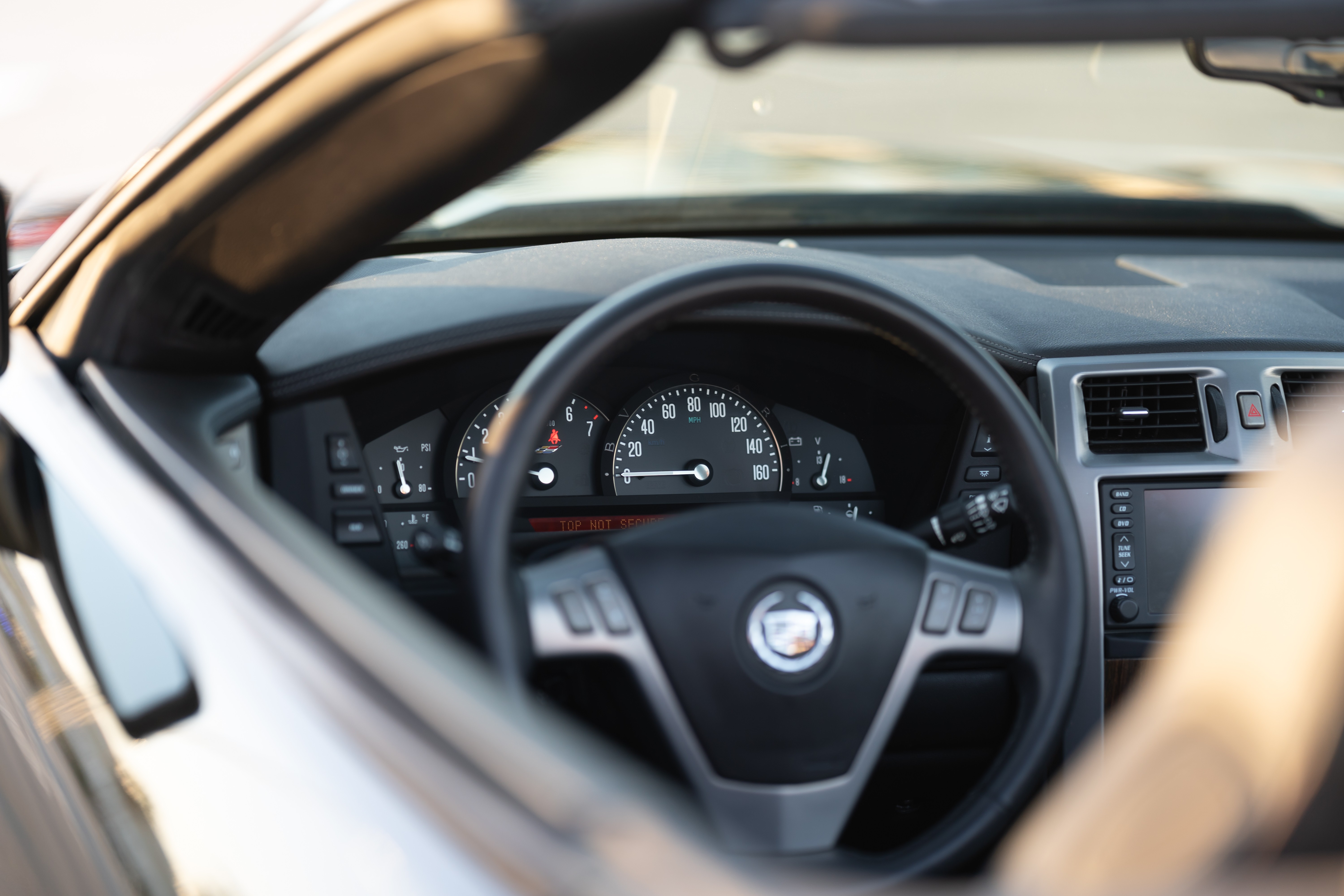 Gauge cluster on a 2006 Black Raven Cadillac XLR-V with Ebony interior in Corpus Christi, TX.