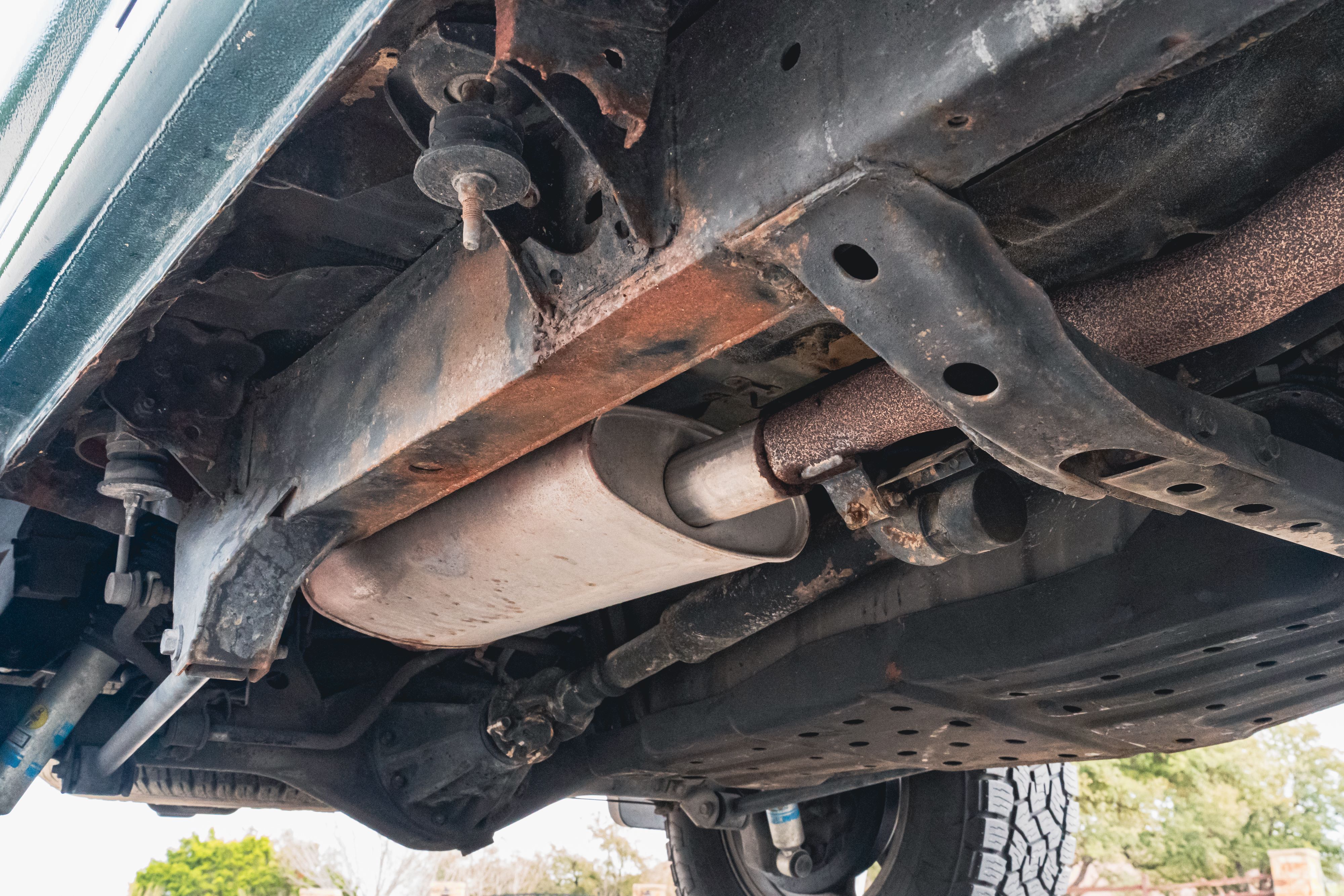 Undercarriage of an Imperial Jade Mica 2000 Toyota 4Runner SR5 shot in Austin, TX.