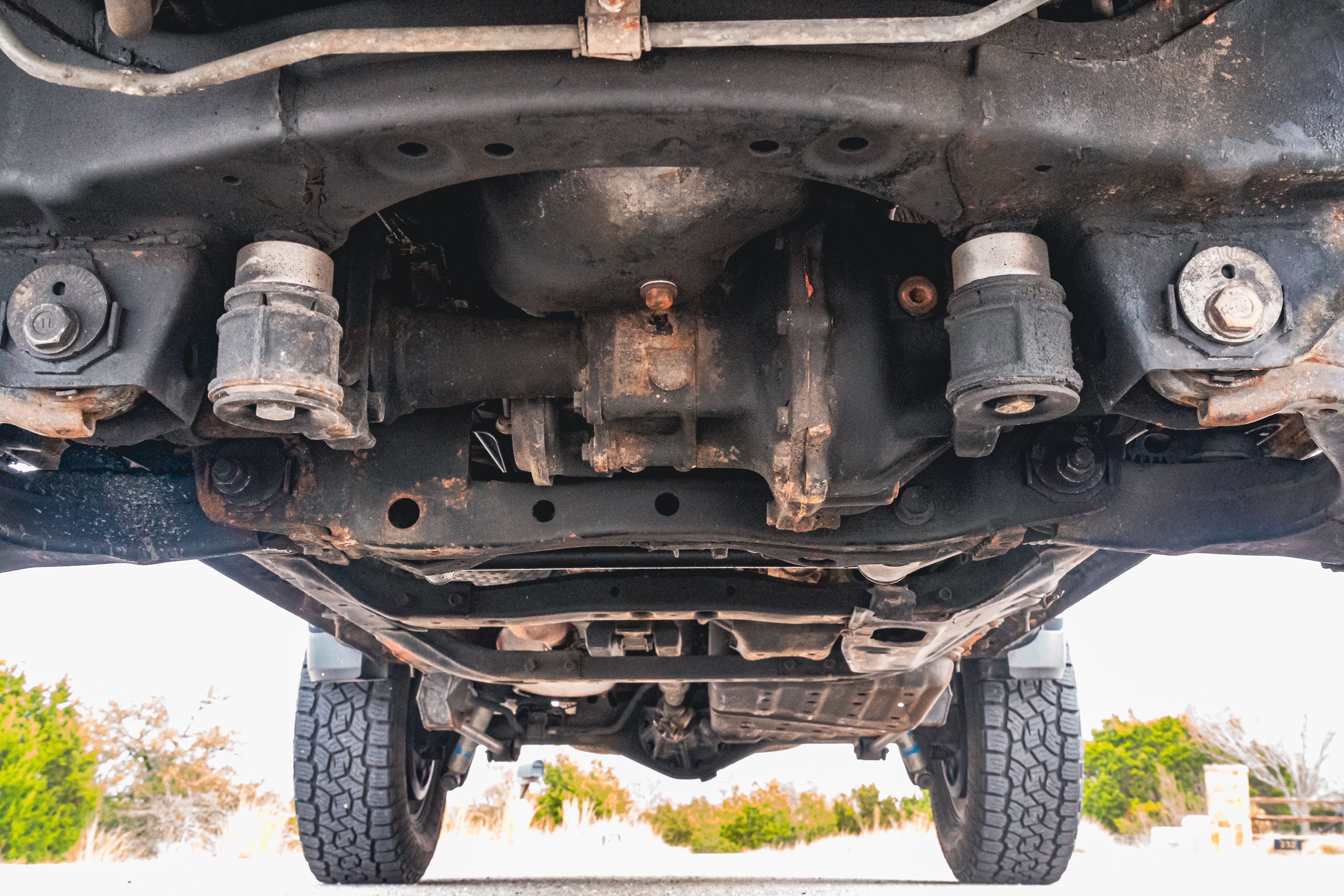 Undercarriage of an Imperial Jade Mica 2000 Toyota 4Runner SR5 shot in Austin, TX.