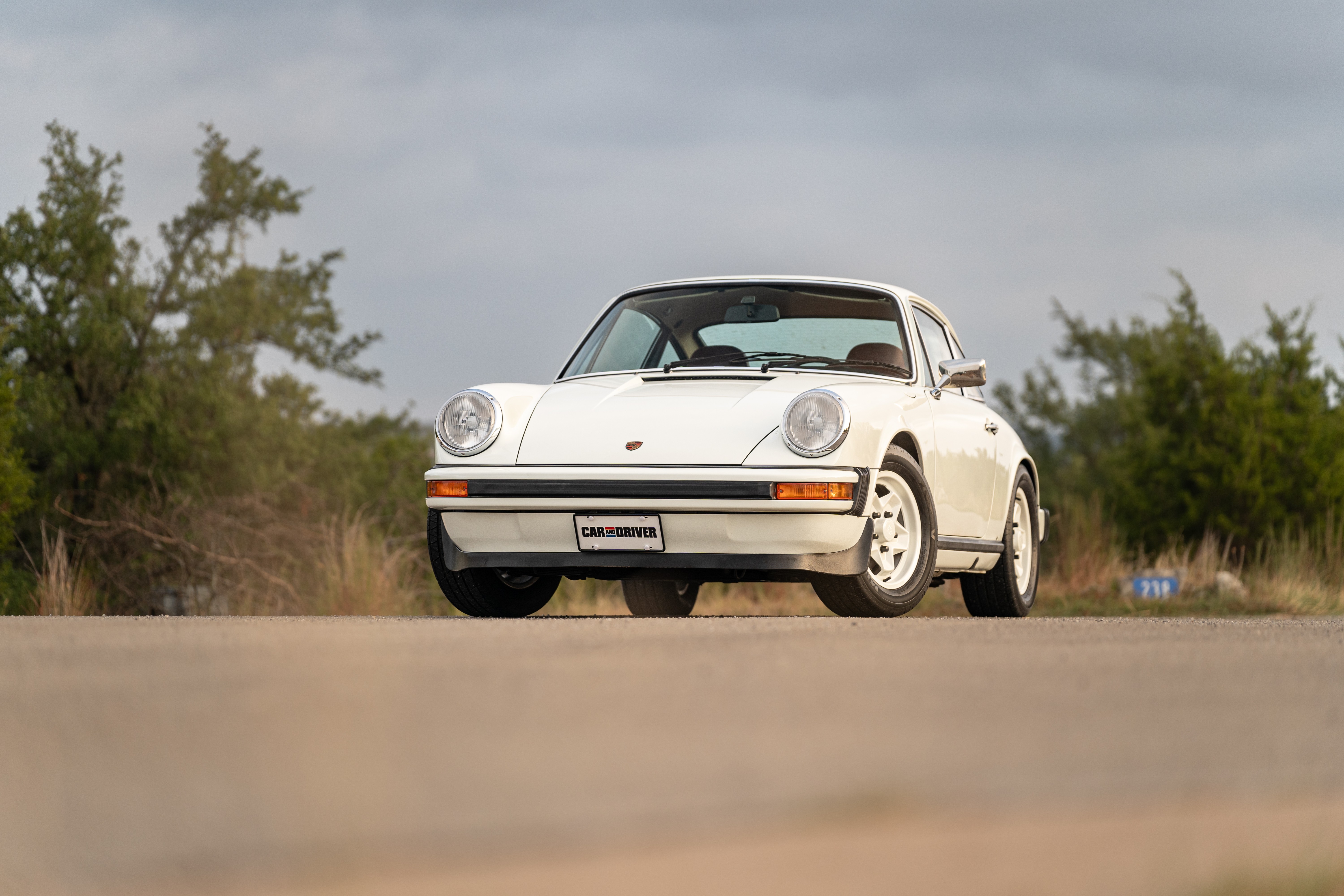 White on Red 1974 Porsche 911 Coupe 5-Speed shot in Austin, TX.