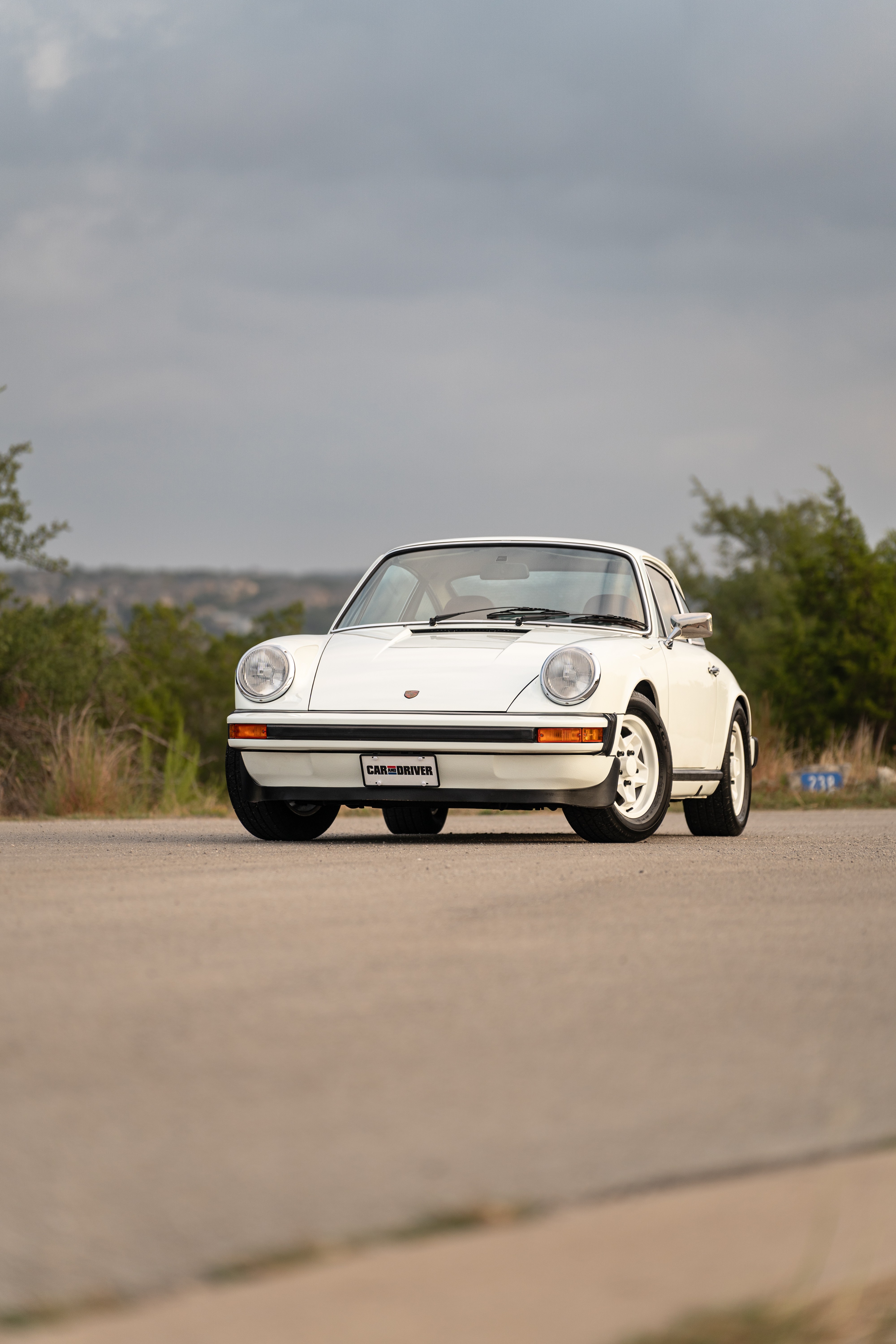 White on Red 1974 Porsche 911 Coupe 5-Speed shot in Austin, TX.