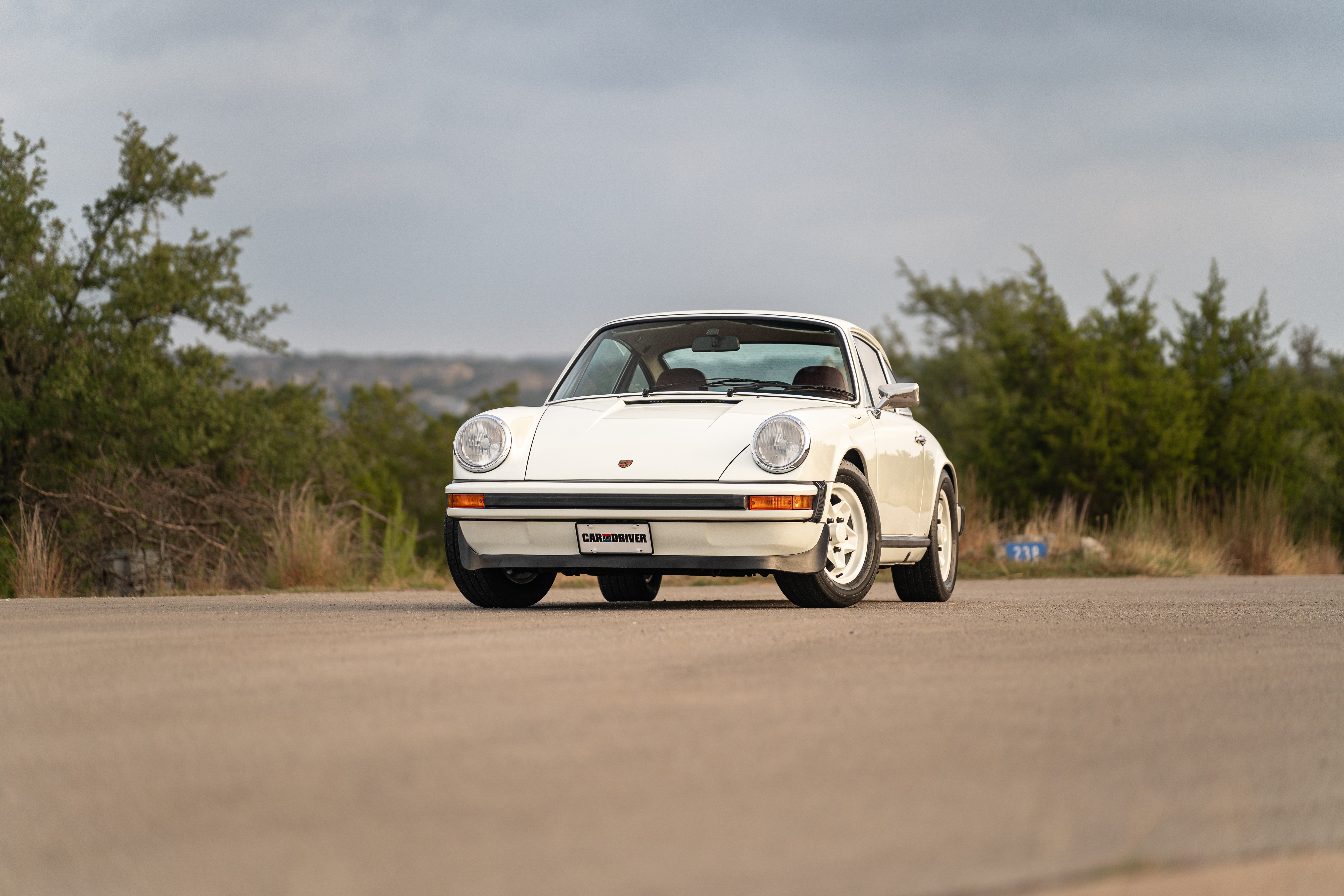 White on Red 1974 Porsche 911 Coupe 5-Speed shot in Austin, TX.