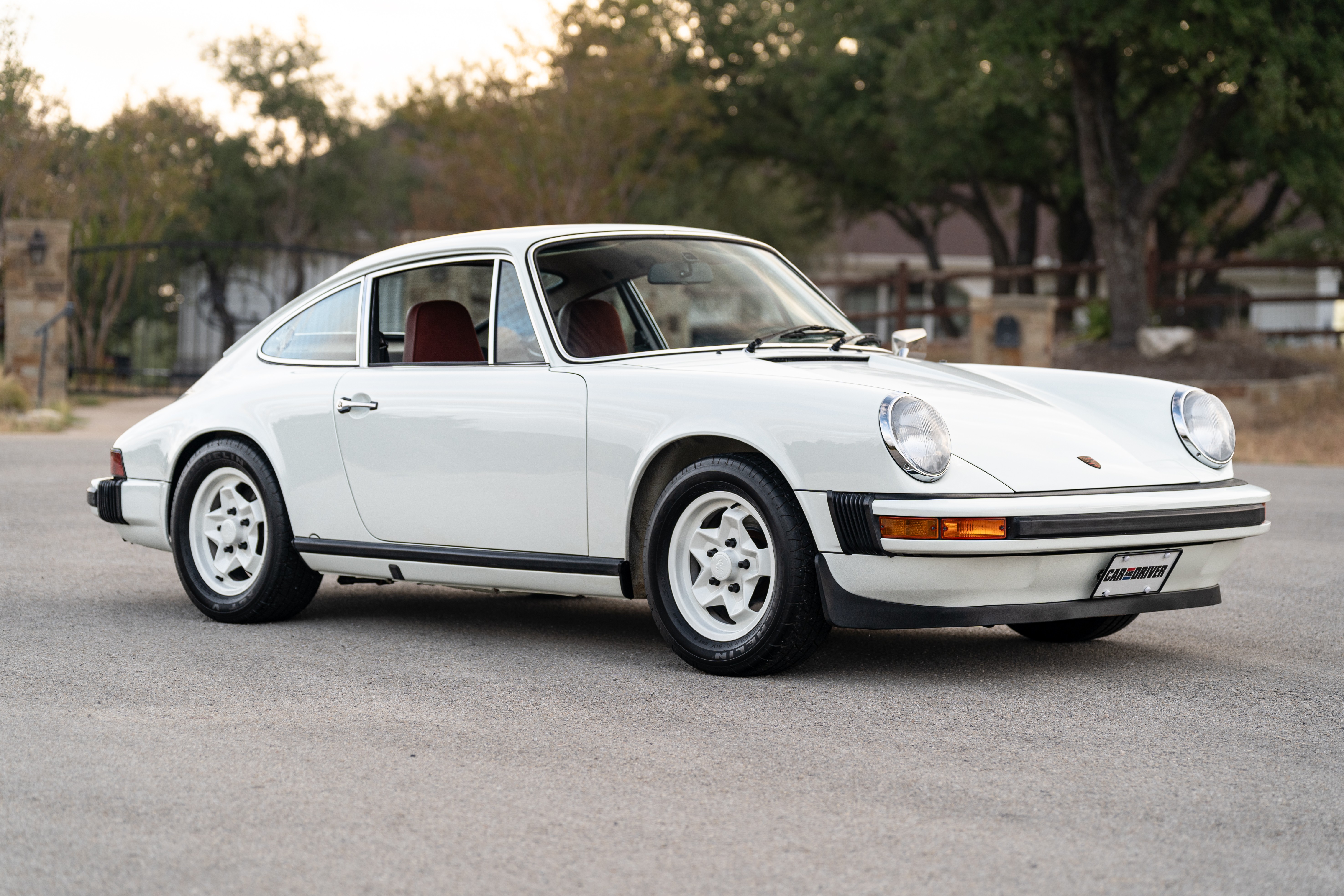 White on Red 1974 Porsche 911 Coupe 5-Speed shot in Austin, TX.