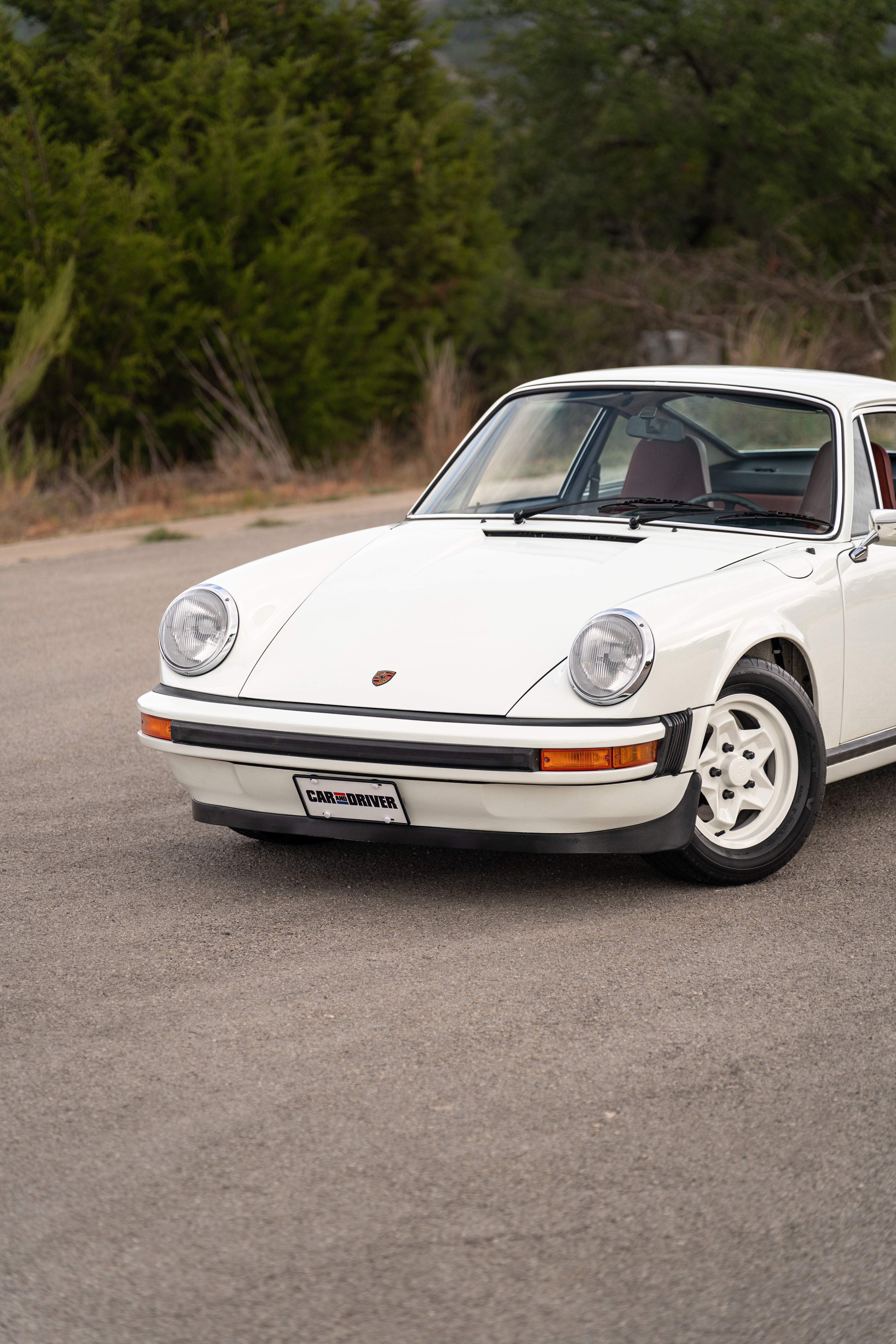 White on Red 1974 Porsche 911 Coupe 5-Speed shot in Austin, TX.