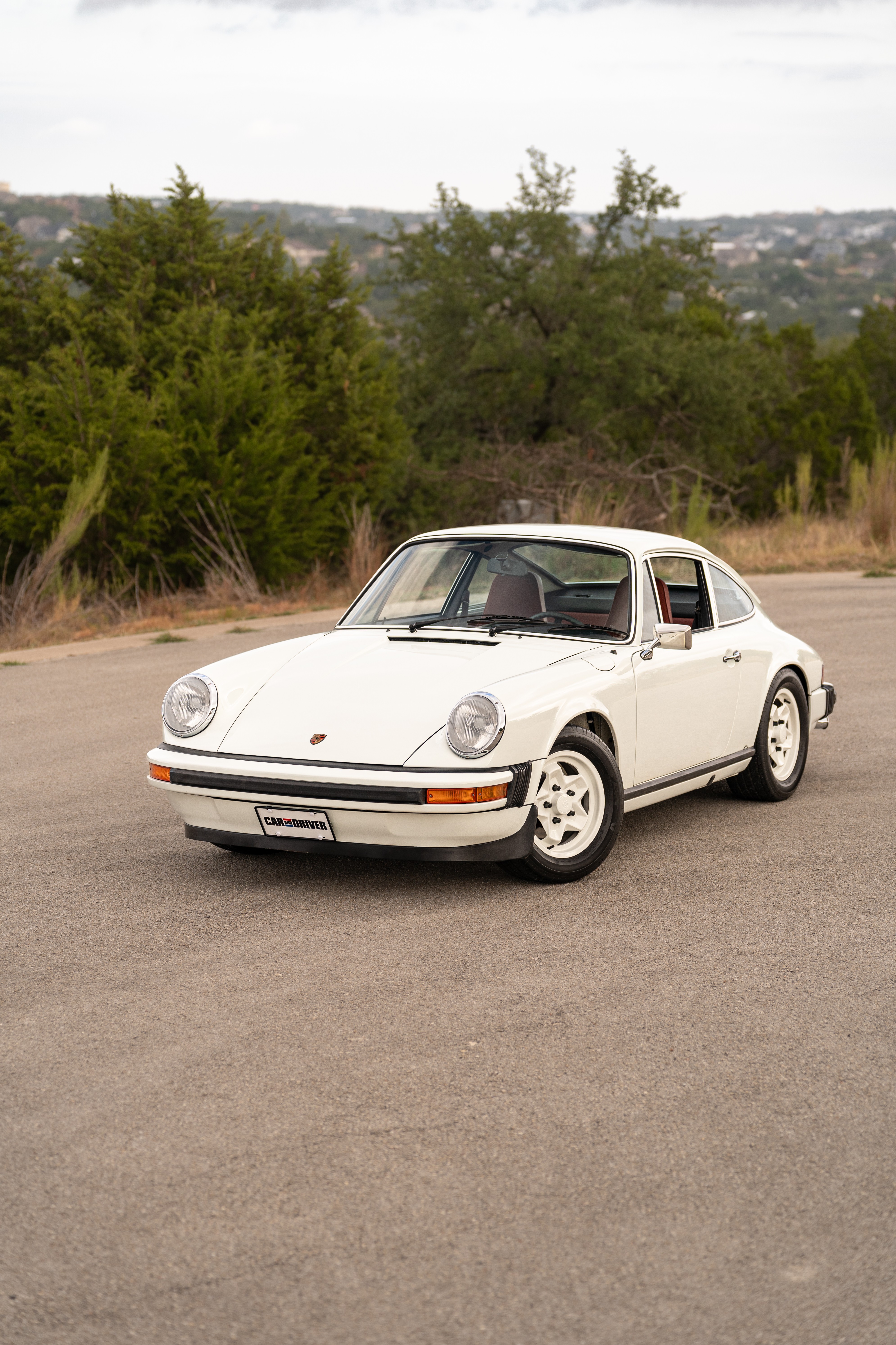 White on Red 1974 Porsche 911 Coupe 5-Speed shot in Austin, TX.