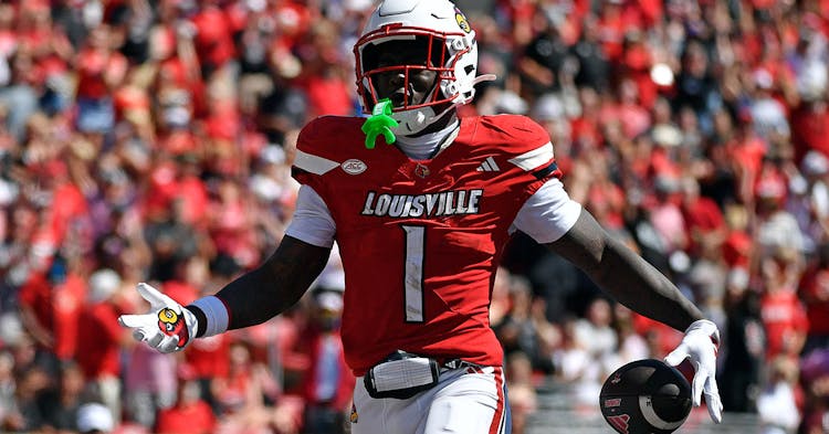 Isaac Brown celebrating a touchdown.