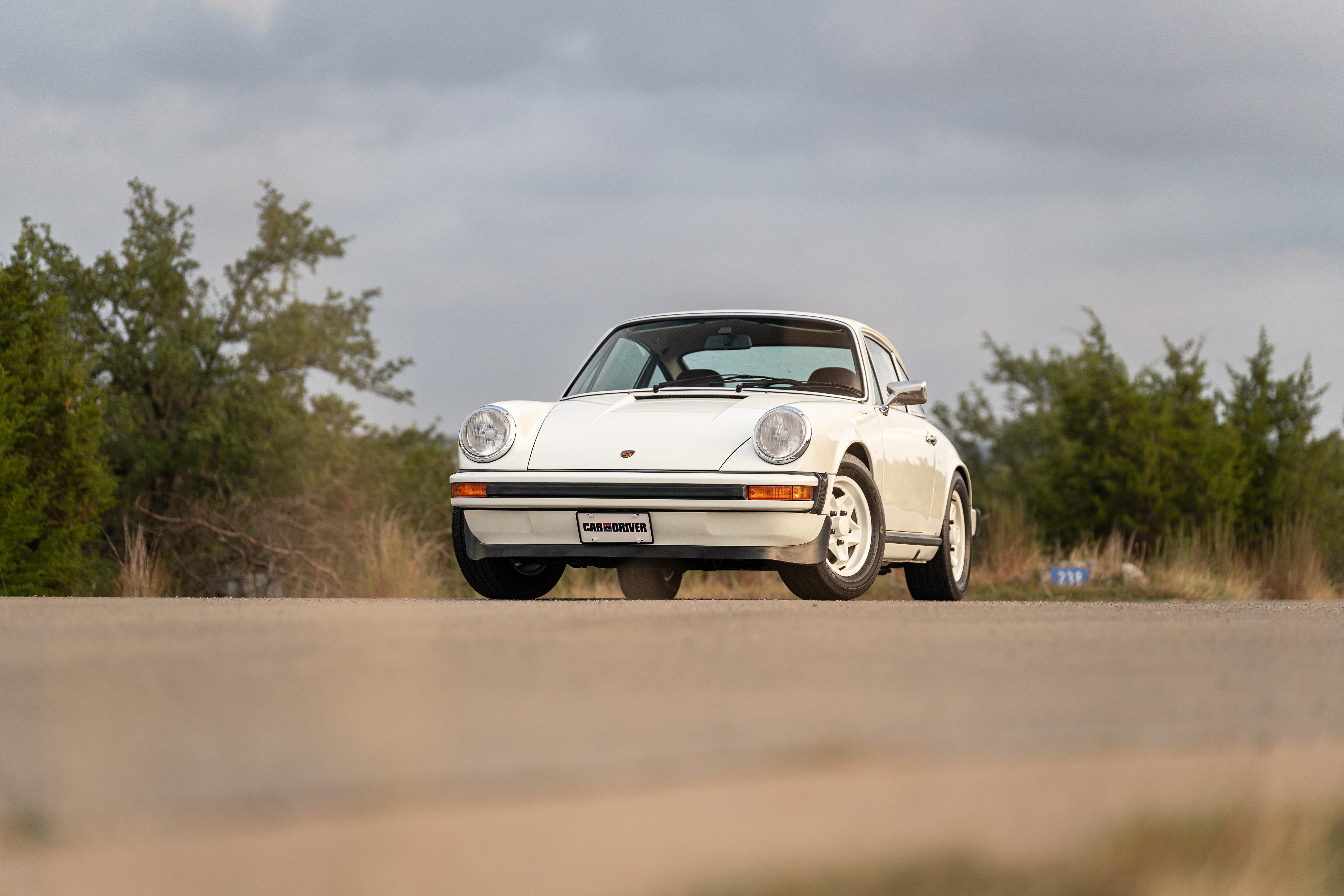 White on Red 1974 Porsche 911 Coupe 5-Speed shot in Austin, TX.