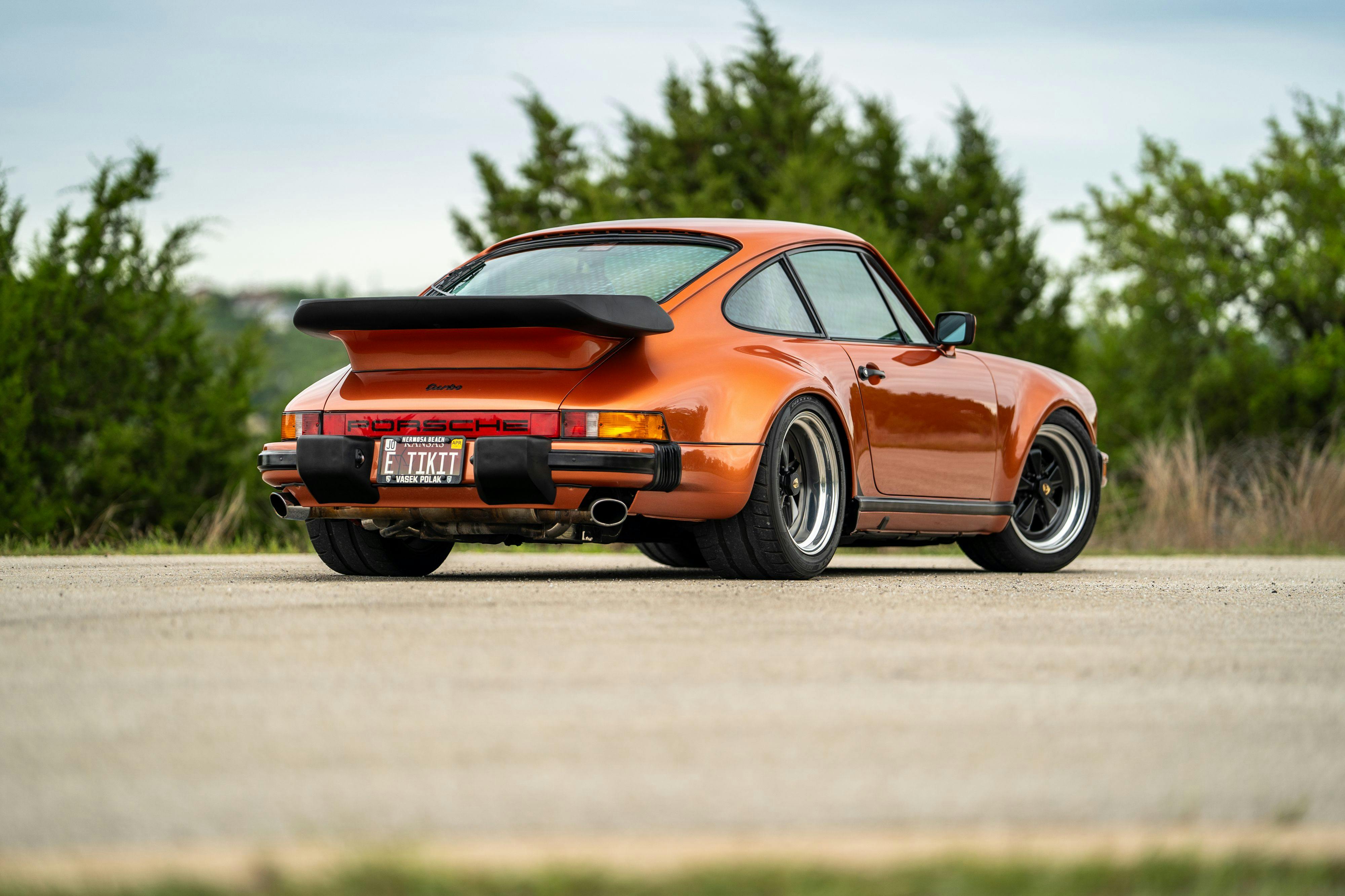 1986 Porsche 930 Turbo in Metallic Orange over Black.