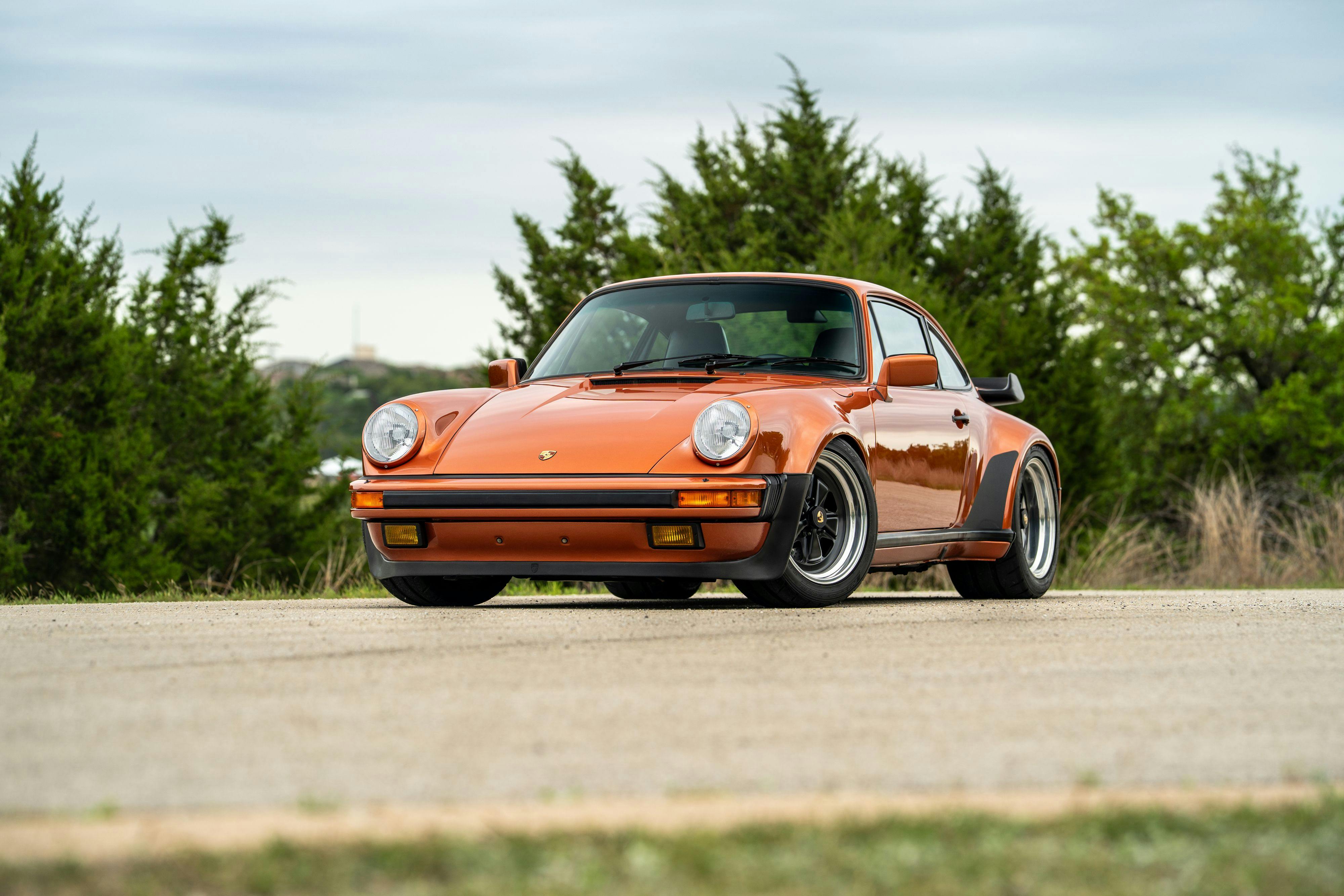 1986 Porsche 930 Turbo in Metallic Orange over Black.