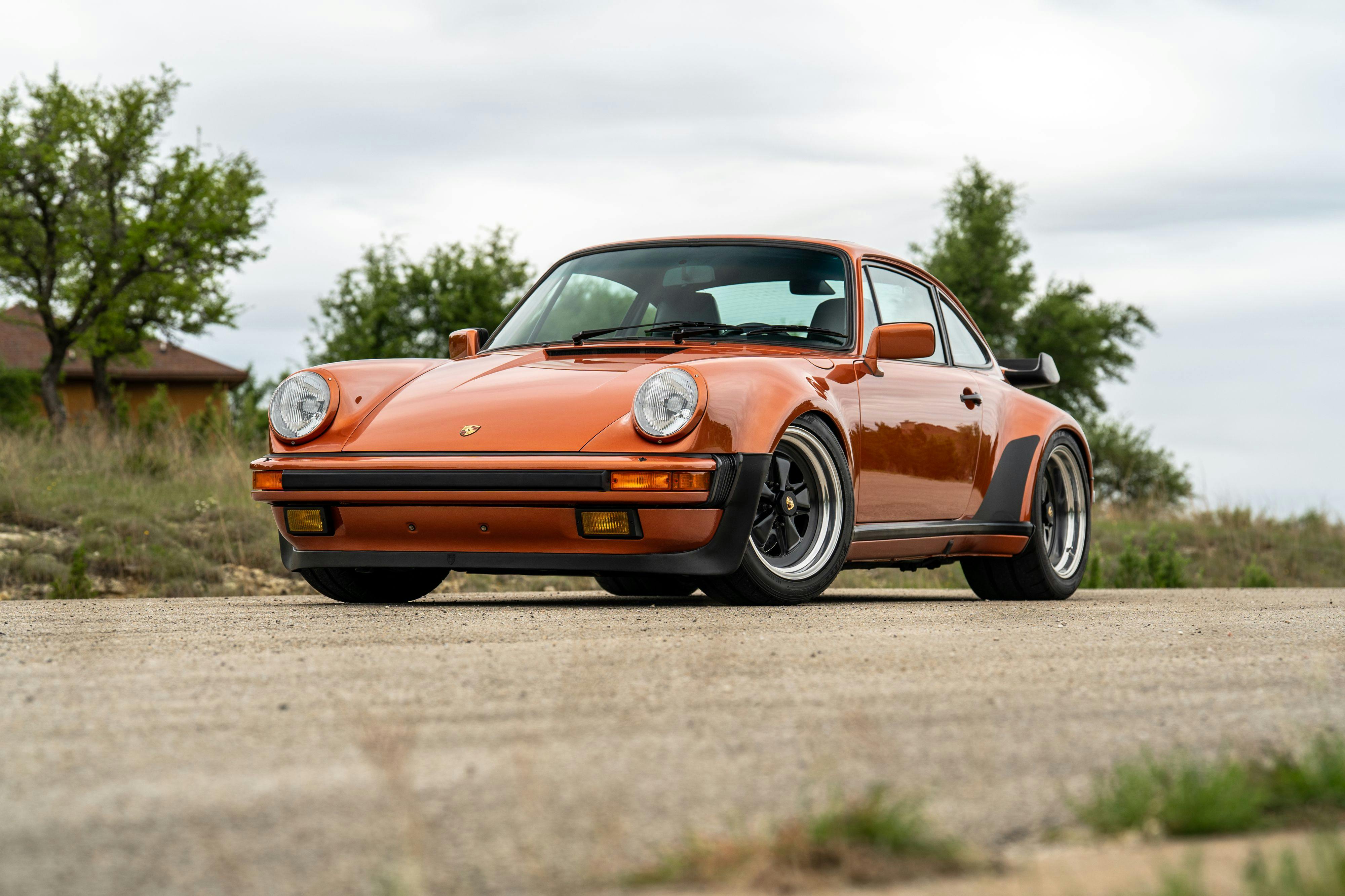 1986 Porsche 930 Turbo in Metallic Orange over Black.