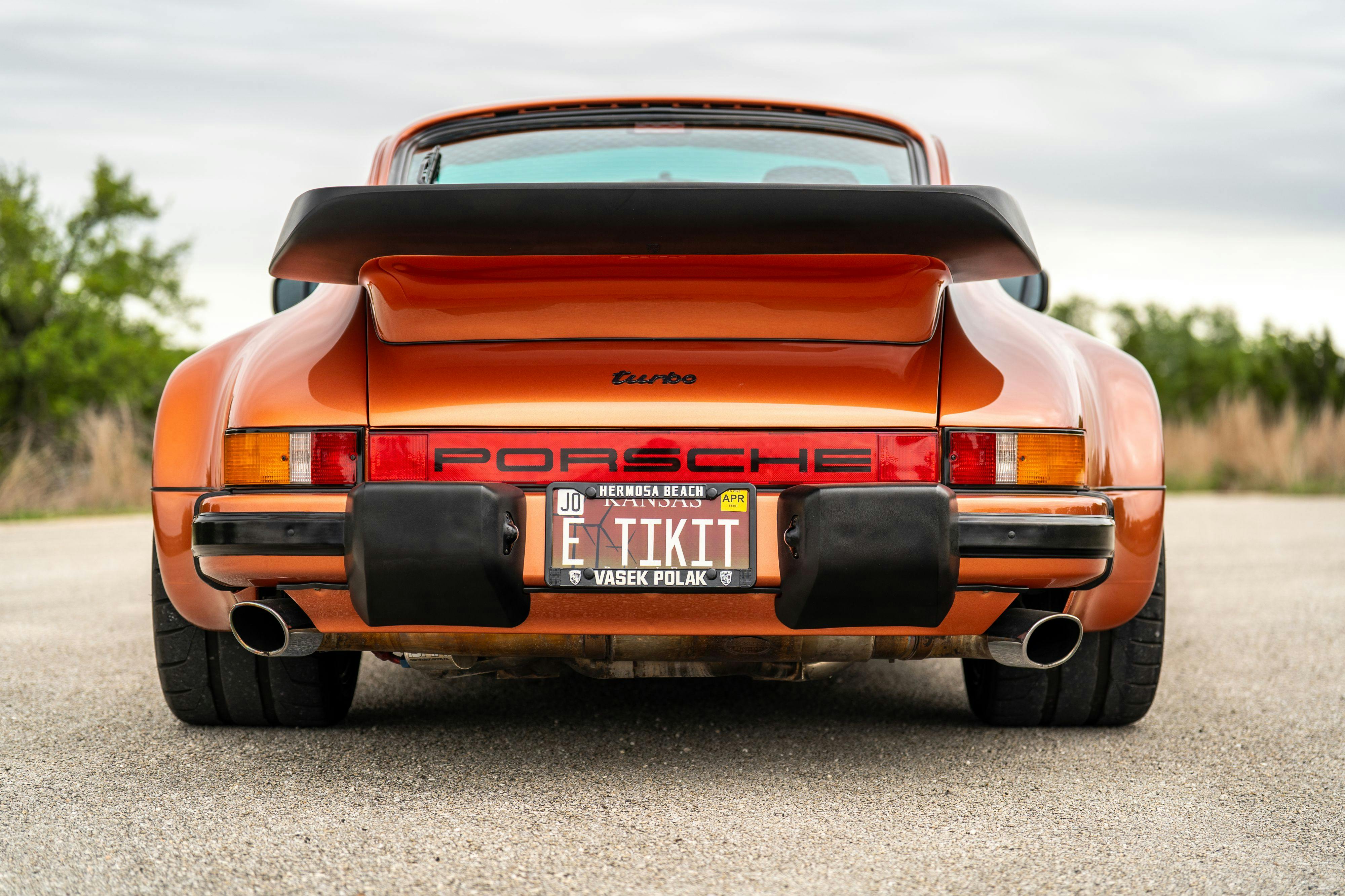 1986 Porsche 930 Turbo in Metallic Orange over Black.