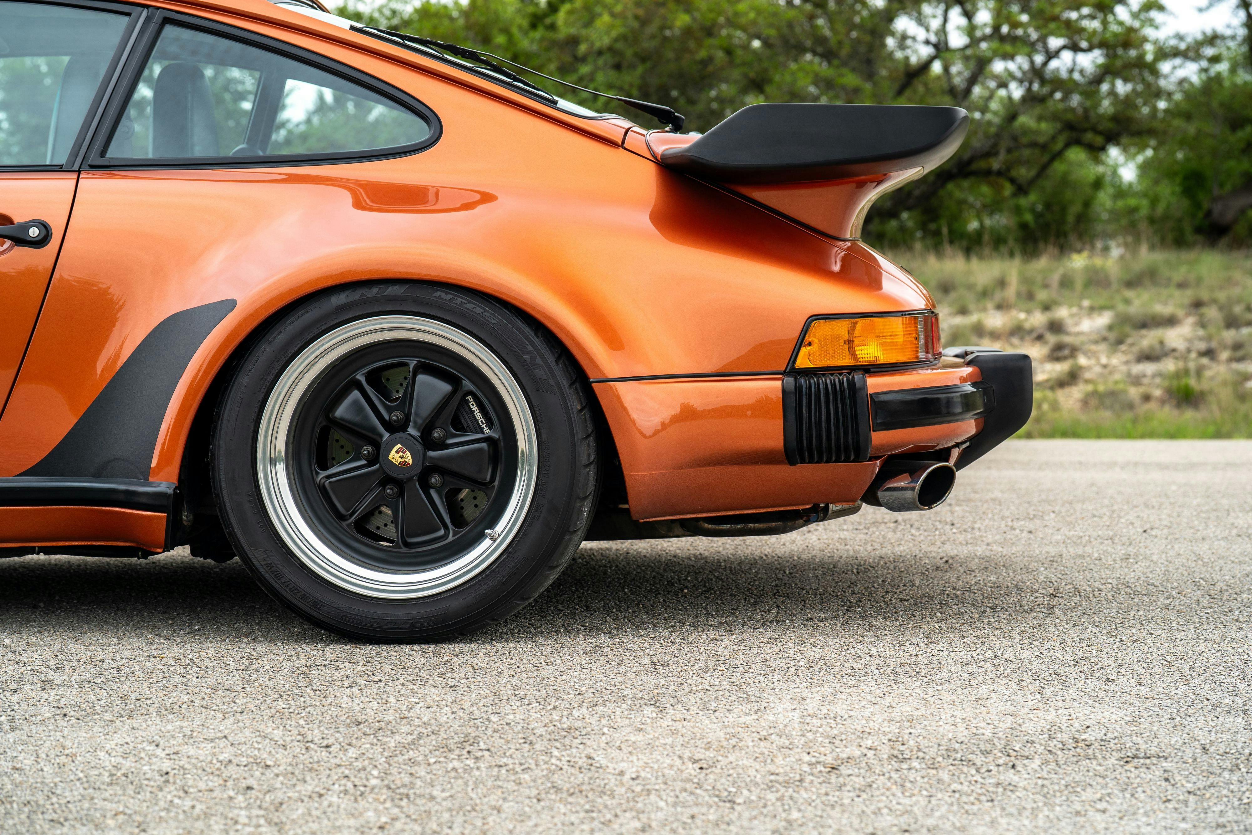 1986 Porsche 930 Turbo in Metallic Orange over Black.