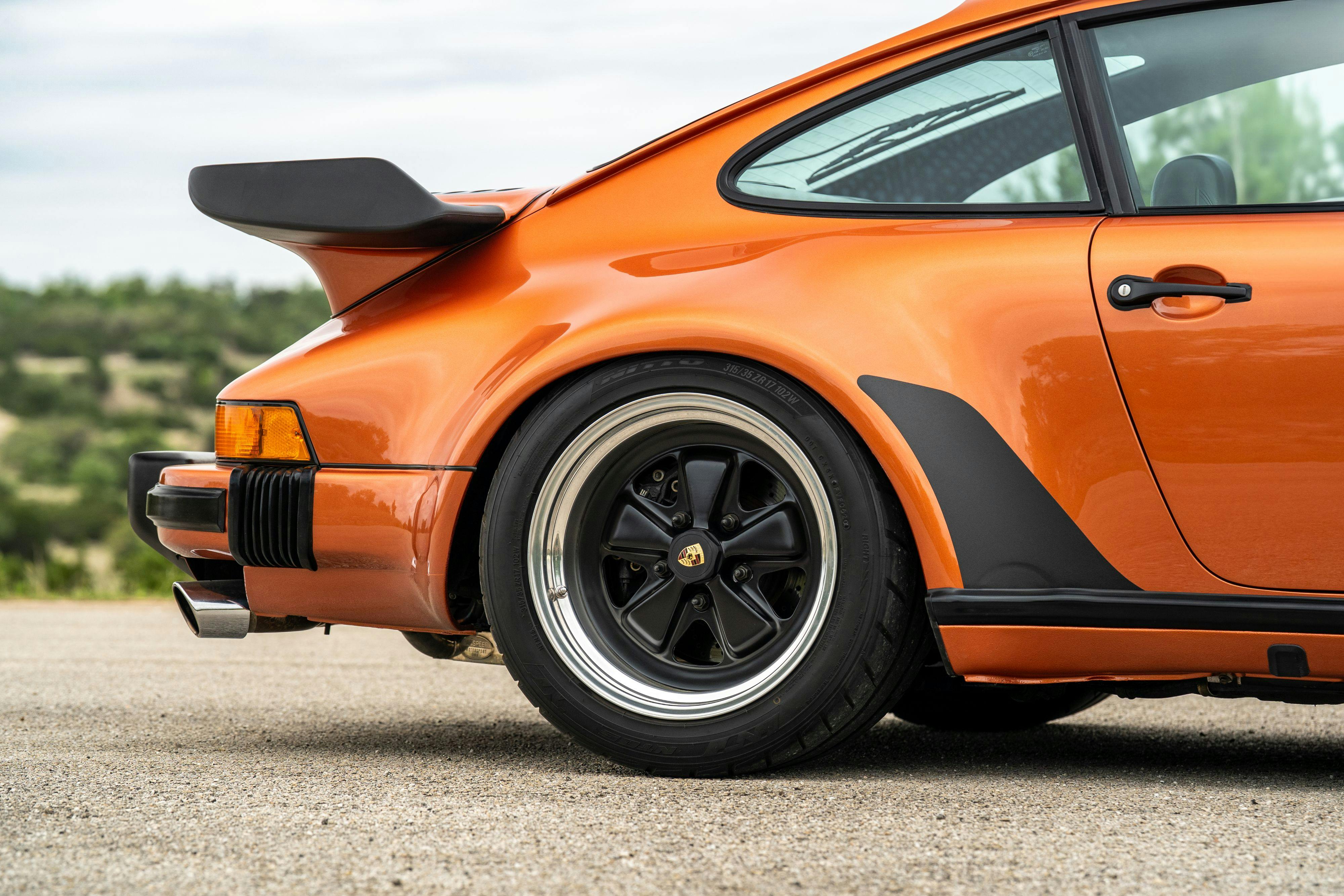 1986 Porsche 930 Turbo in Metallic Orange over Black.