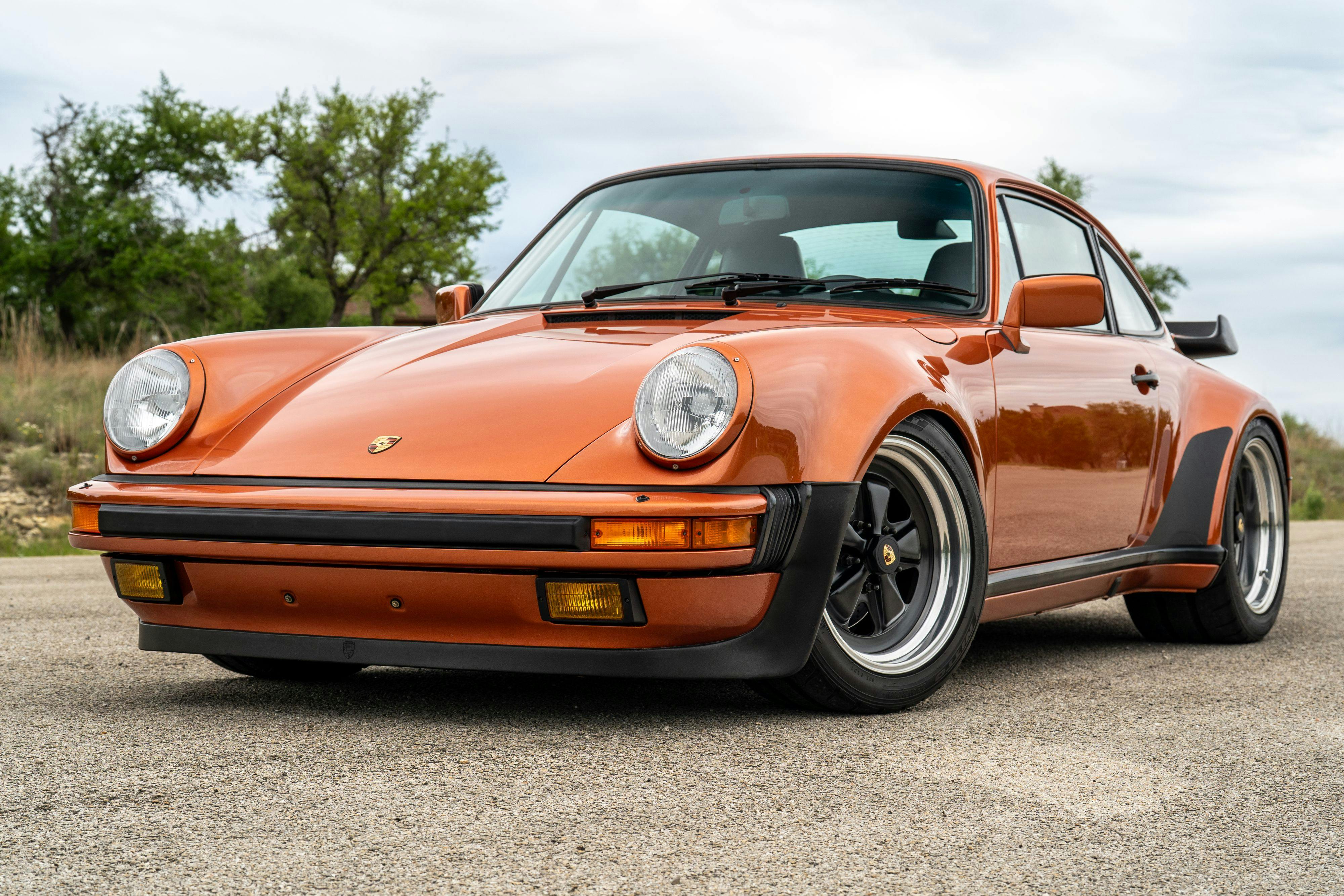 1986 Porsche 930 Turbo in Metallic Orange over Black.