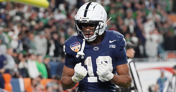 Nicholas Singleton celebrates scoring a touchdown.