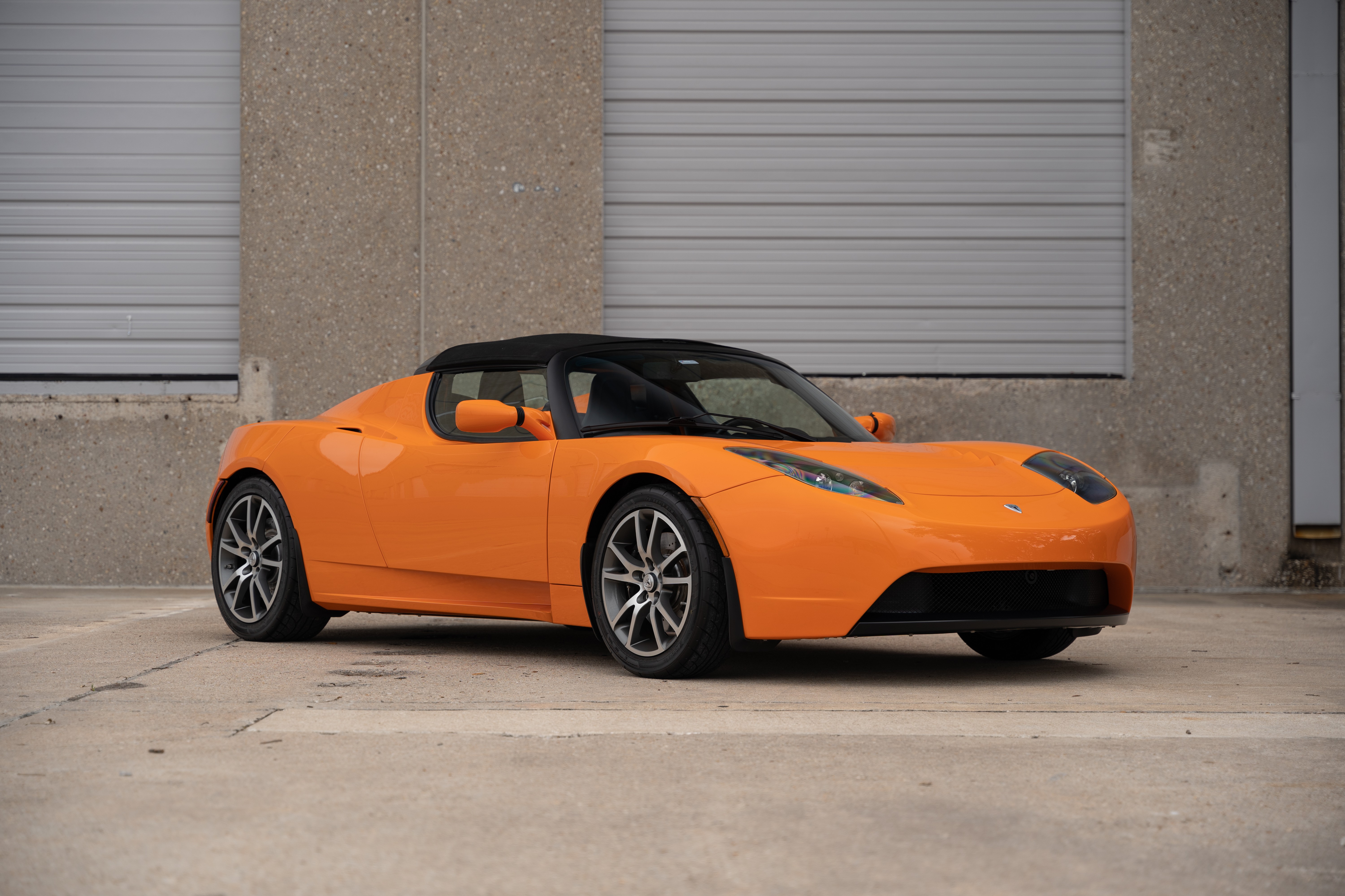 2010 Very Orange Metallic Tesla Roadster in Austin, TX.