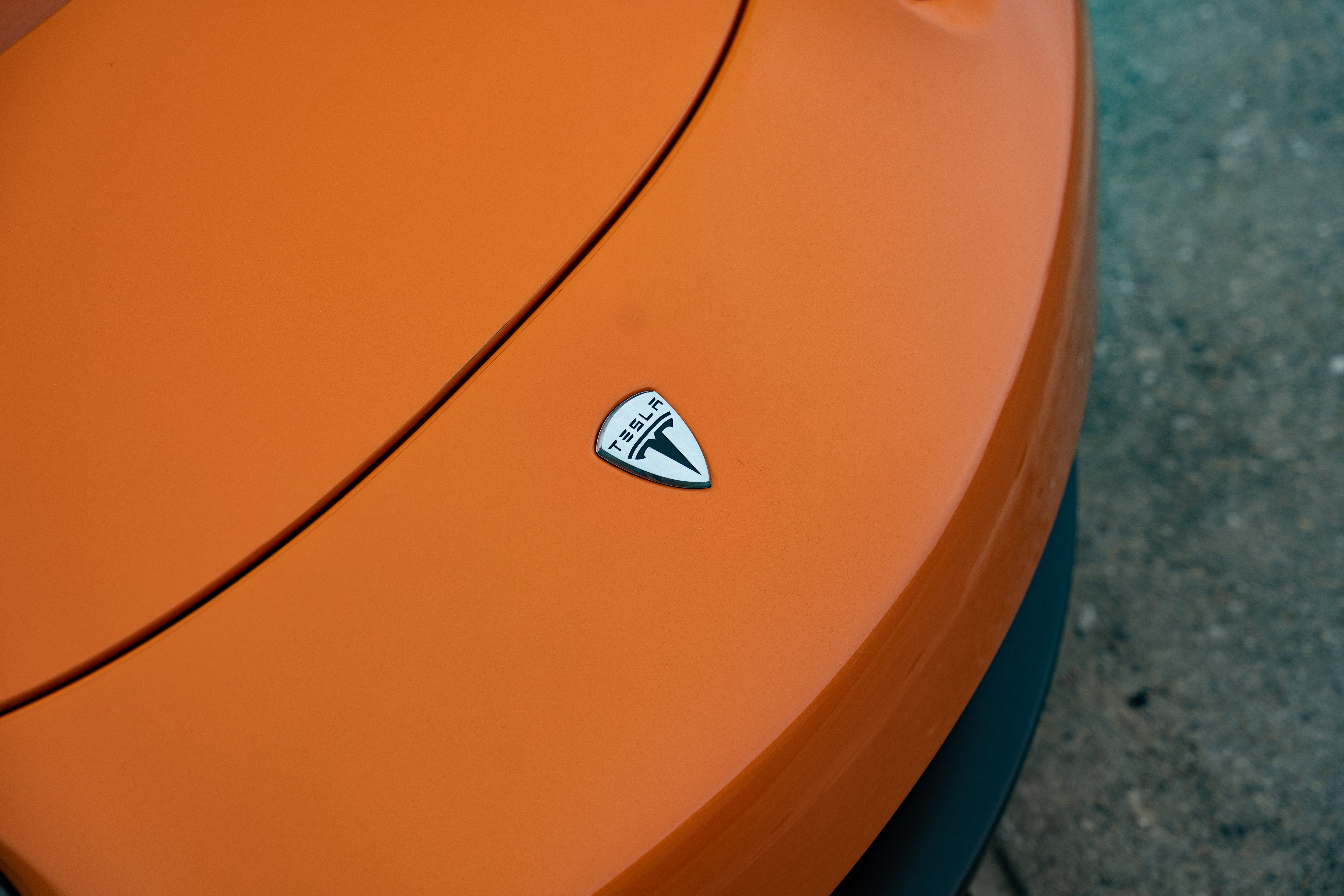 2010 Very Orange Metallic Tesla Roadster in Austin, TX.