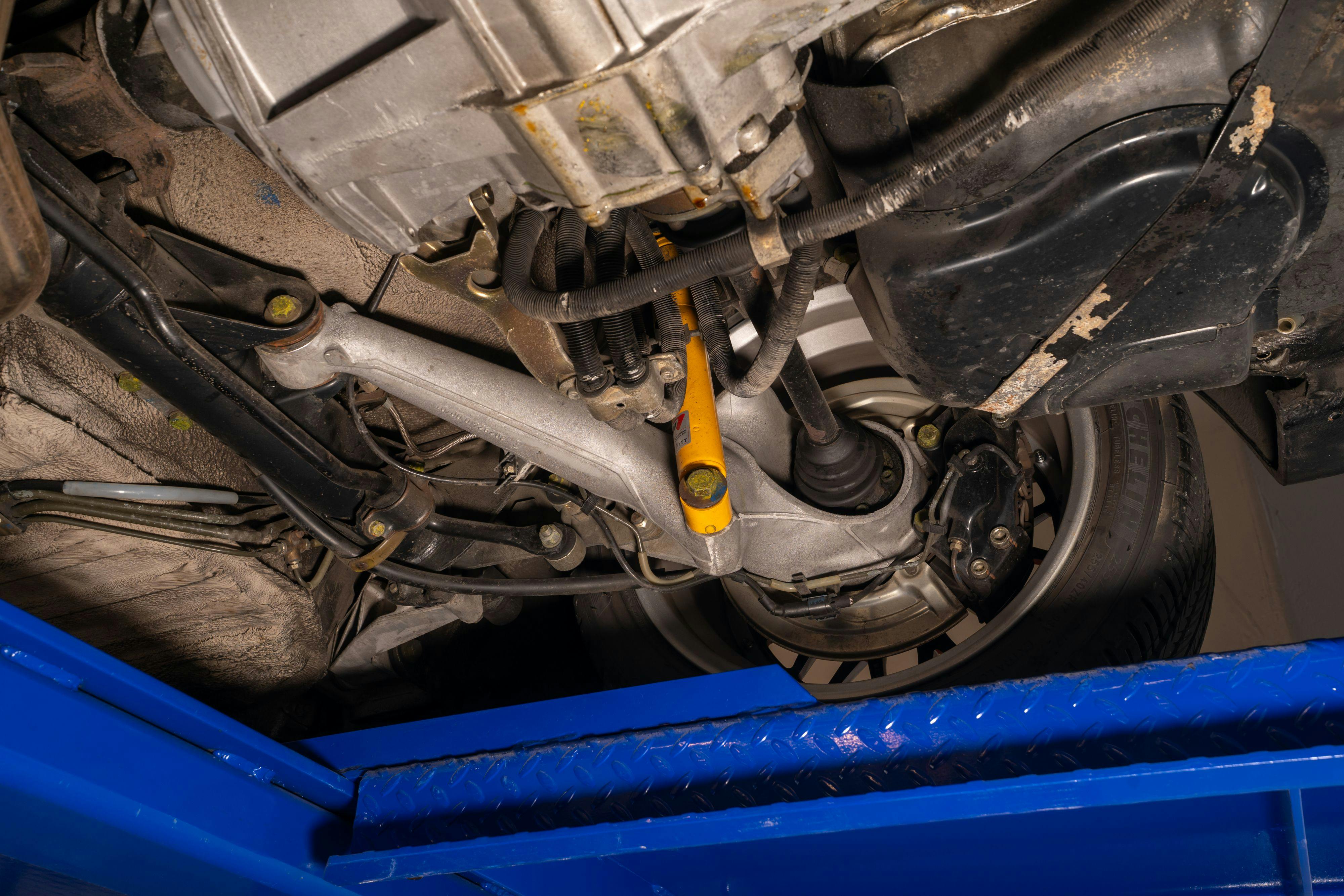 1986 Porsche 944 Turbo underbody in Black on Black in Lakeway, TX.