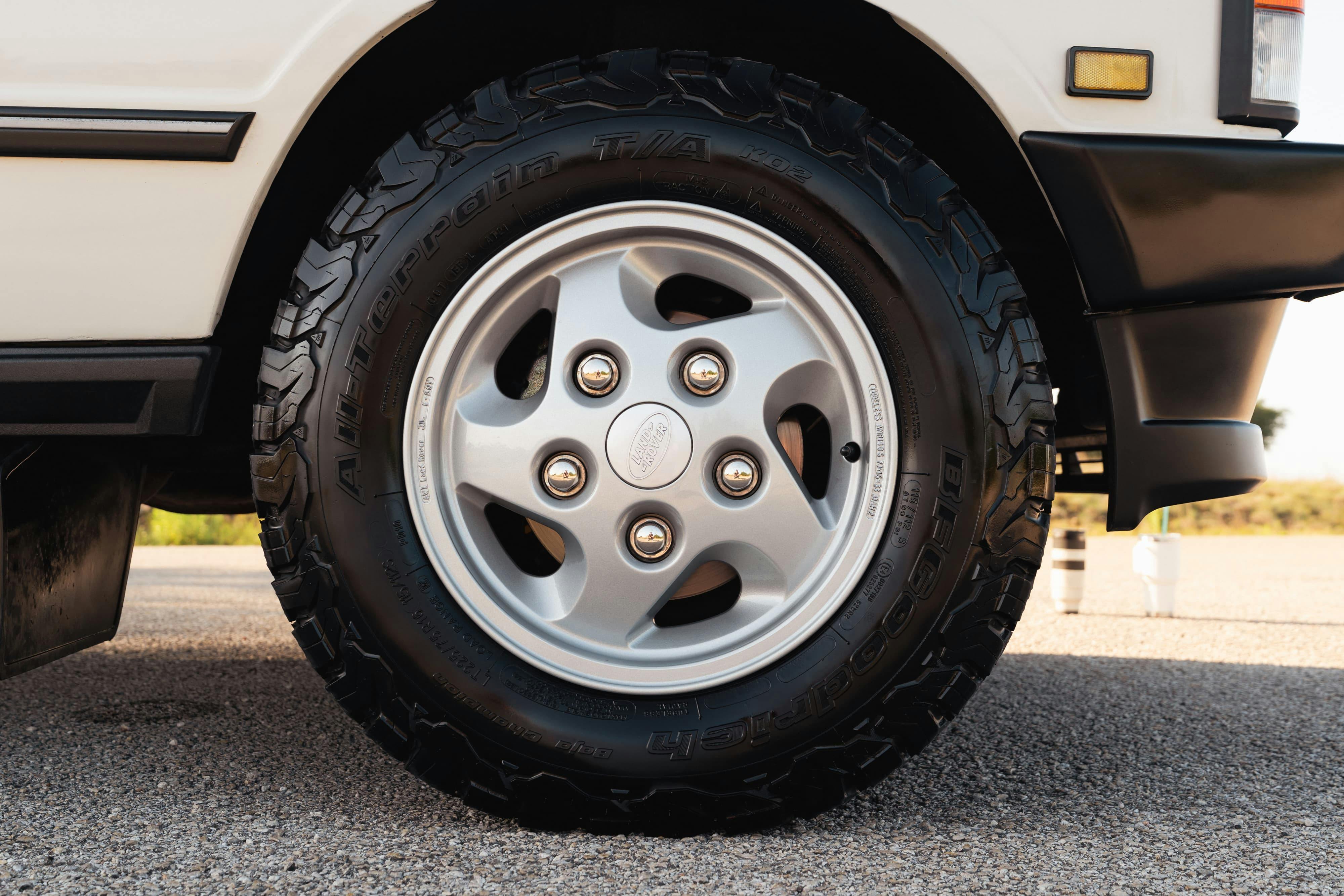 Wheels on a 1995 White Land Rover Range Rover County Long Wheel Base in Austin, TX.