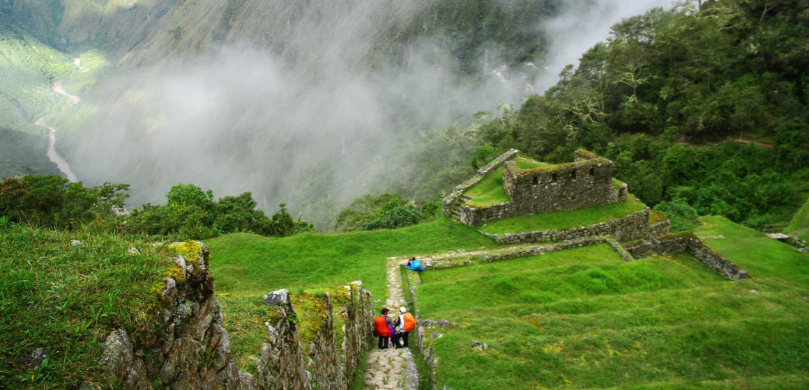 Hikers-at-the-Inca-terraces-of-Intipata-ancient-ruins---The-Adventure-People.png