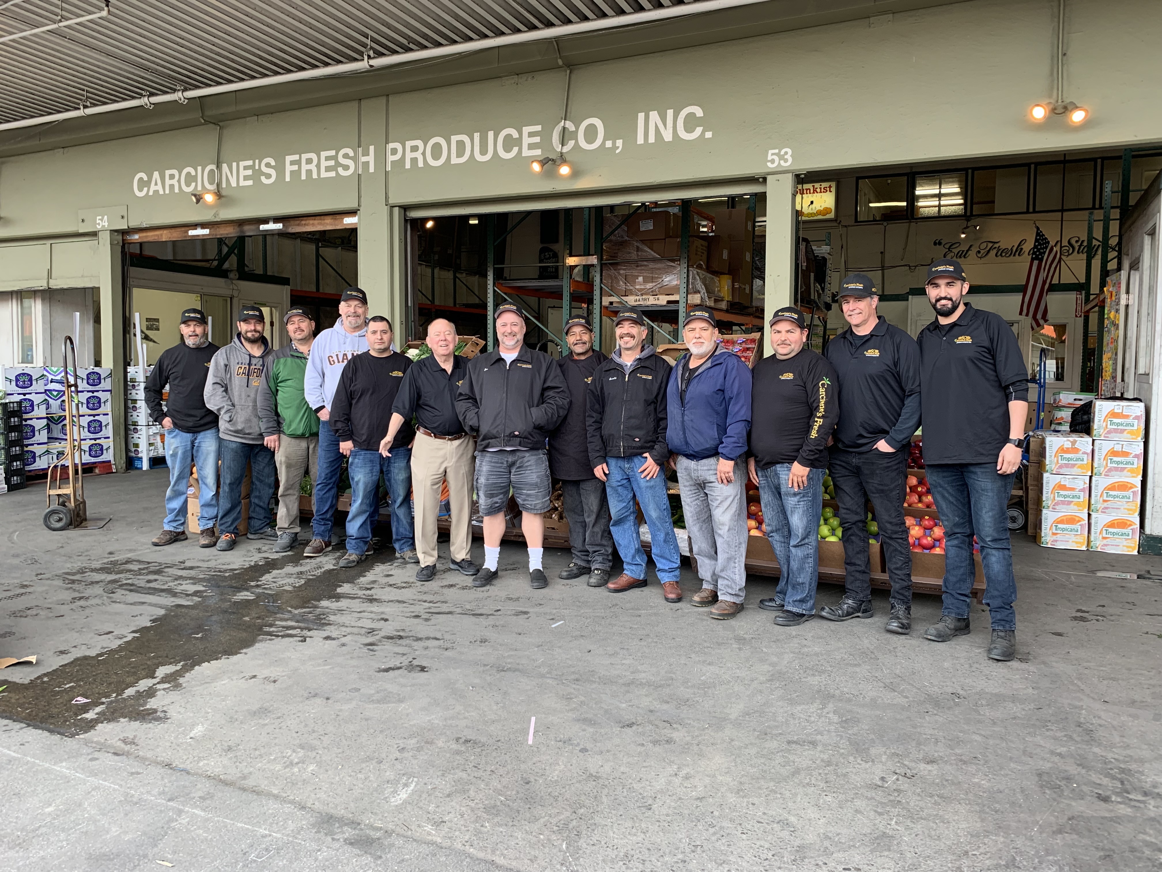 Carcione's Fresh Produce team standing in a row