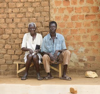 African Village Walk With an Elder's gallery image