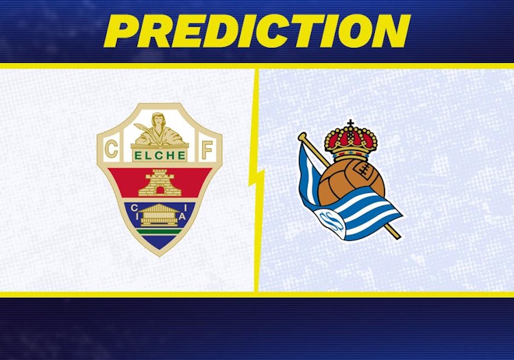 Elche takes on Real Sociedad in La Liga action.