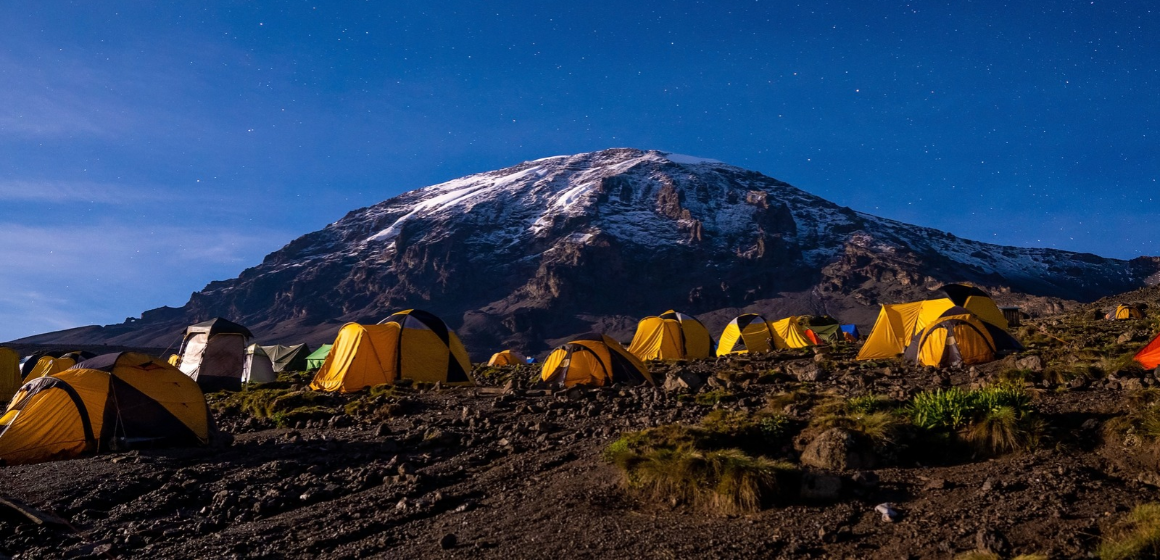 Tents-with-Mt--KIlimanjaro-in-the-background-at-twilight---The-Adventure-People.png