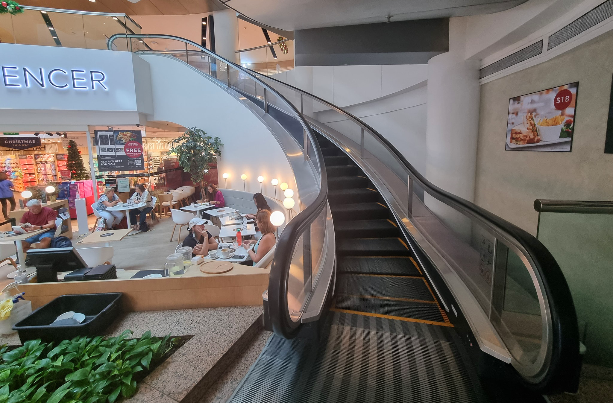 Wheelock Place's famous curved escalators