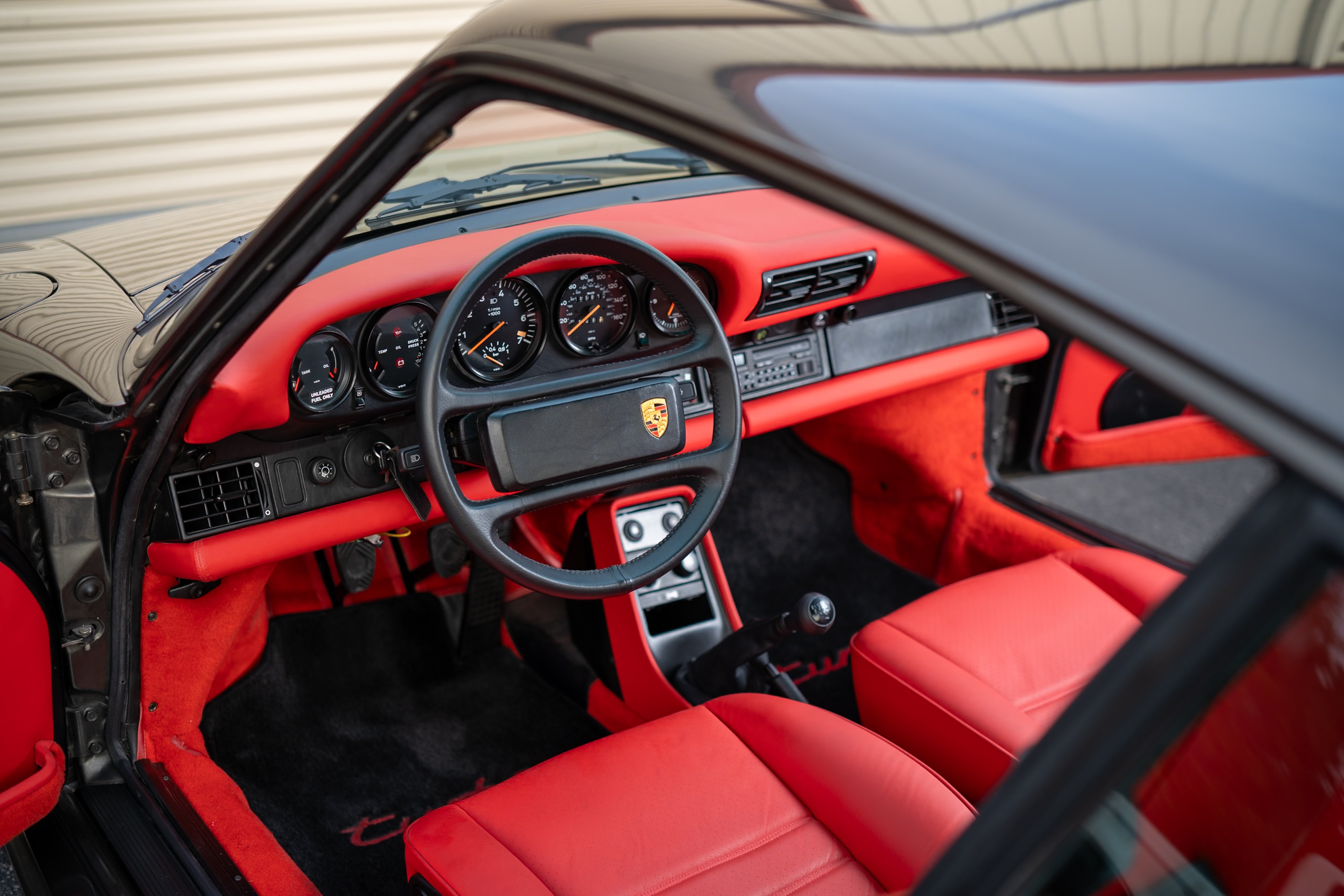 Red interior on a 1989 Porsche 911 Turbo M505 Slant Nose.