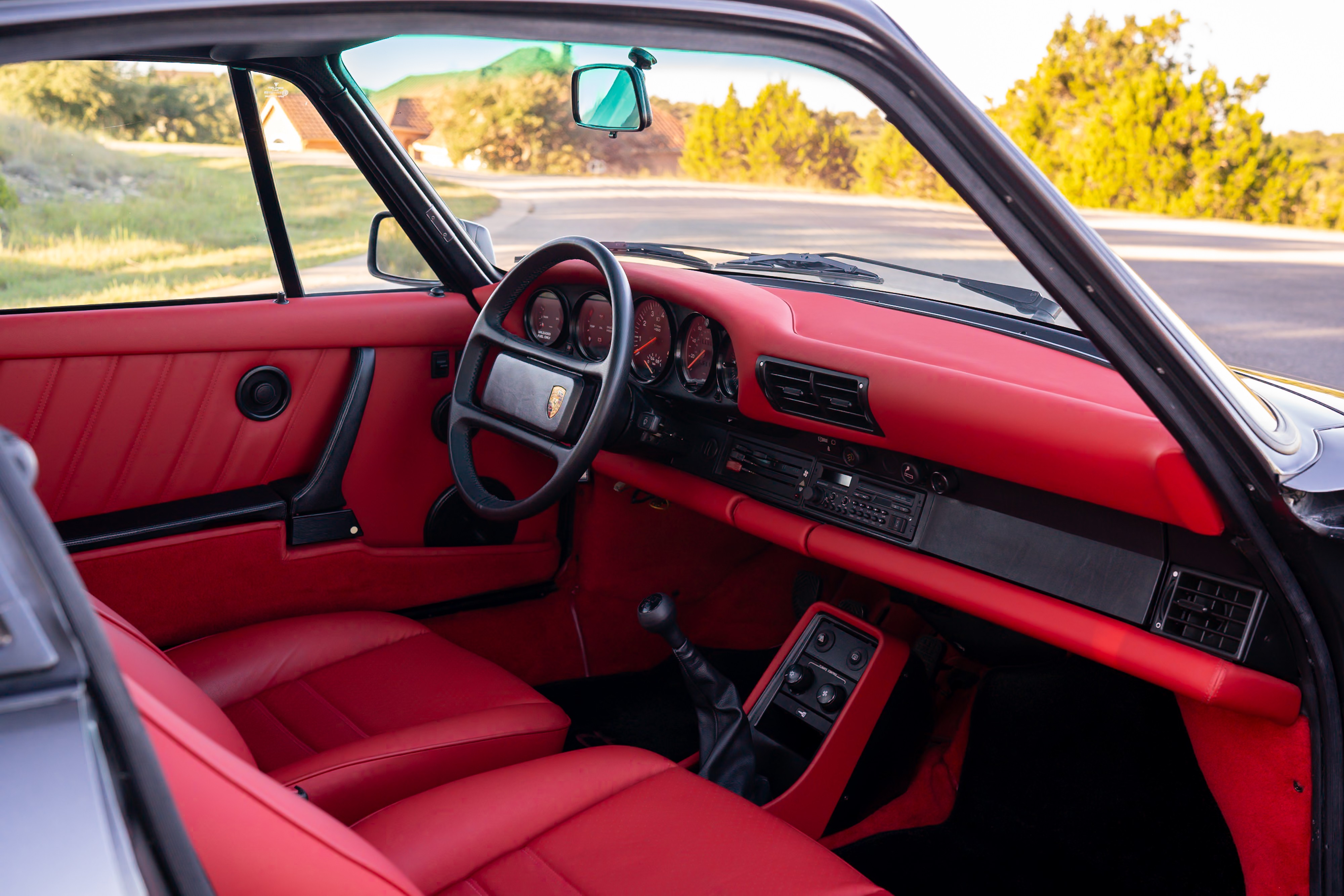 Red interior on a 1989 Porsche 911 Turbo M505 Slant Nose.