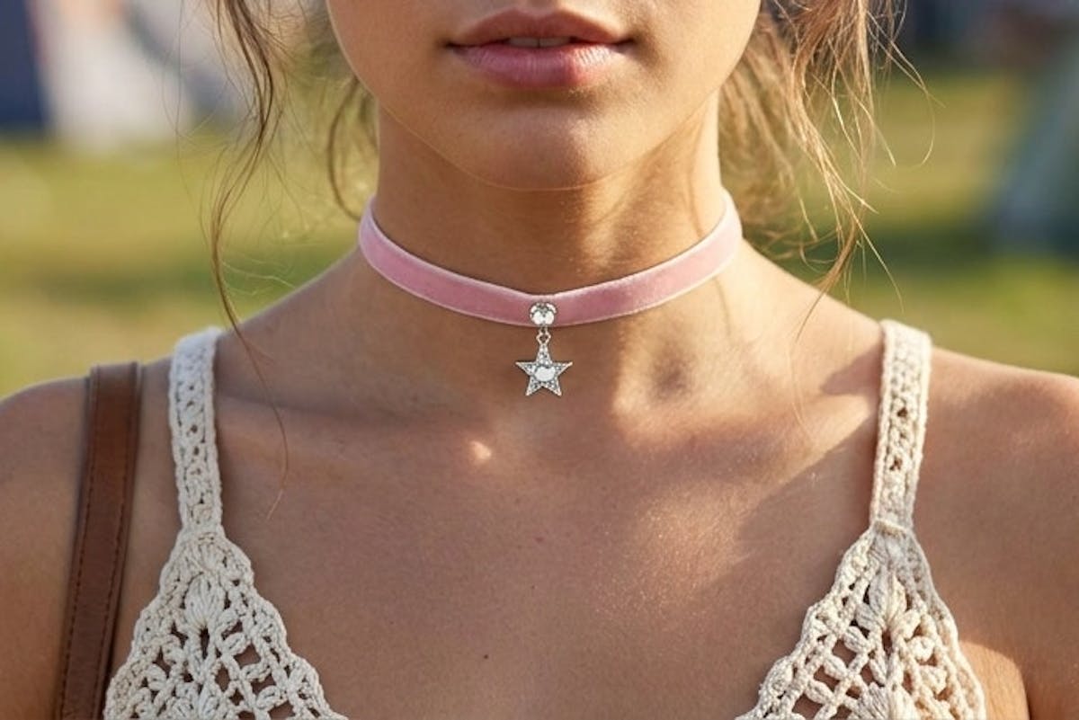 thin pink velvet choker necklace with large rhinestone and star charm