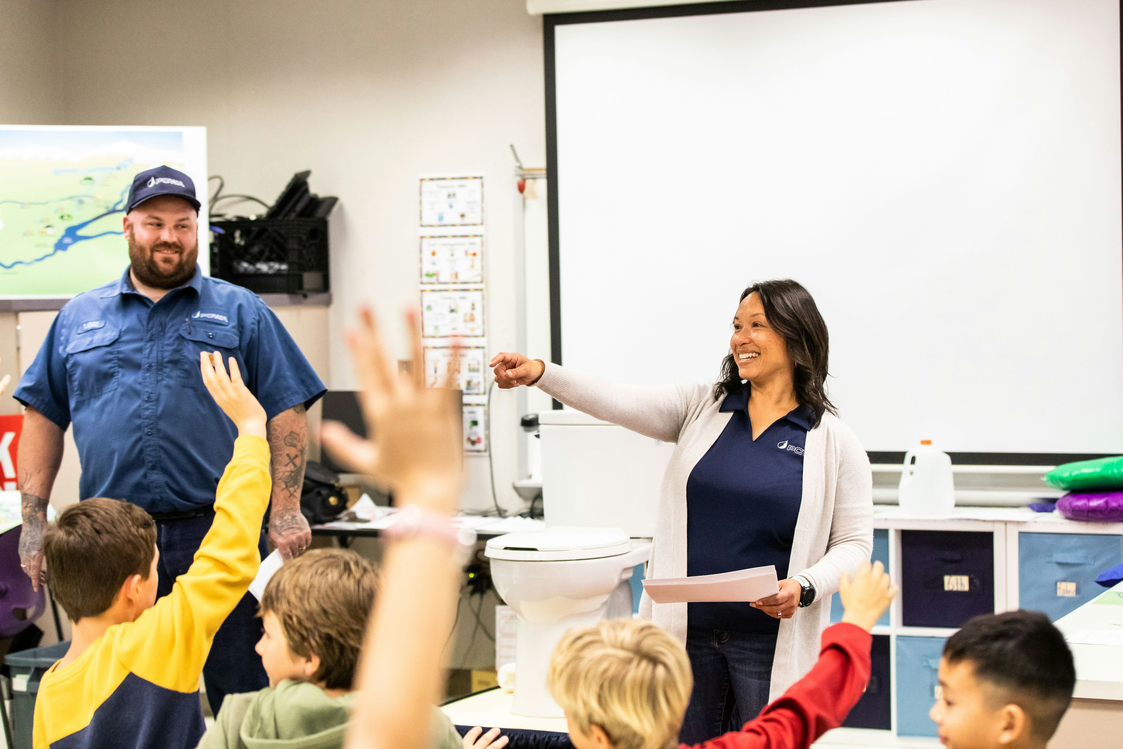 PCWA staff speaking with children in classroom picture 2