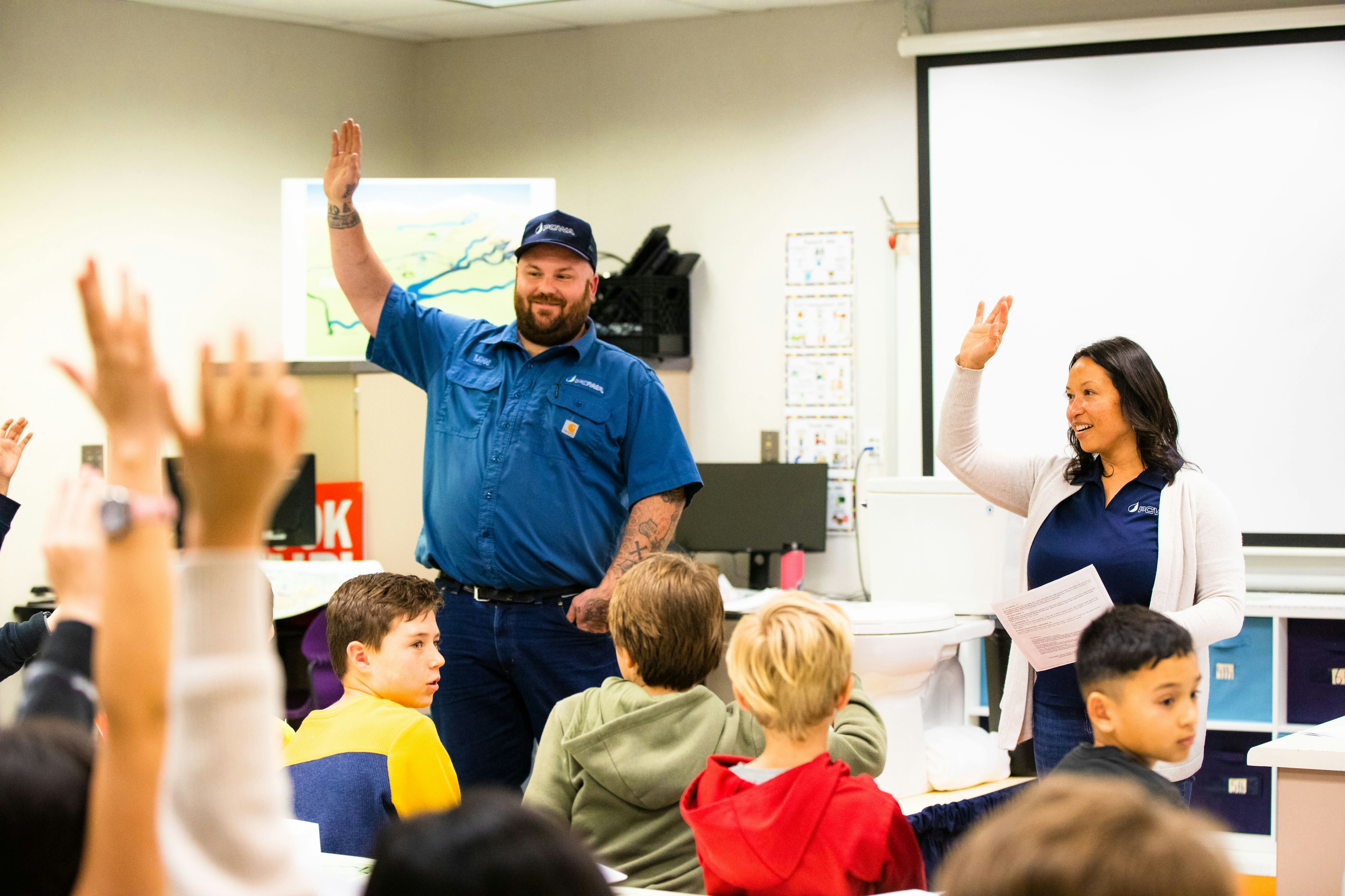 PCWA staff speaking with children in classroom picture 3