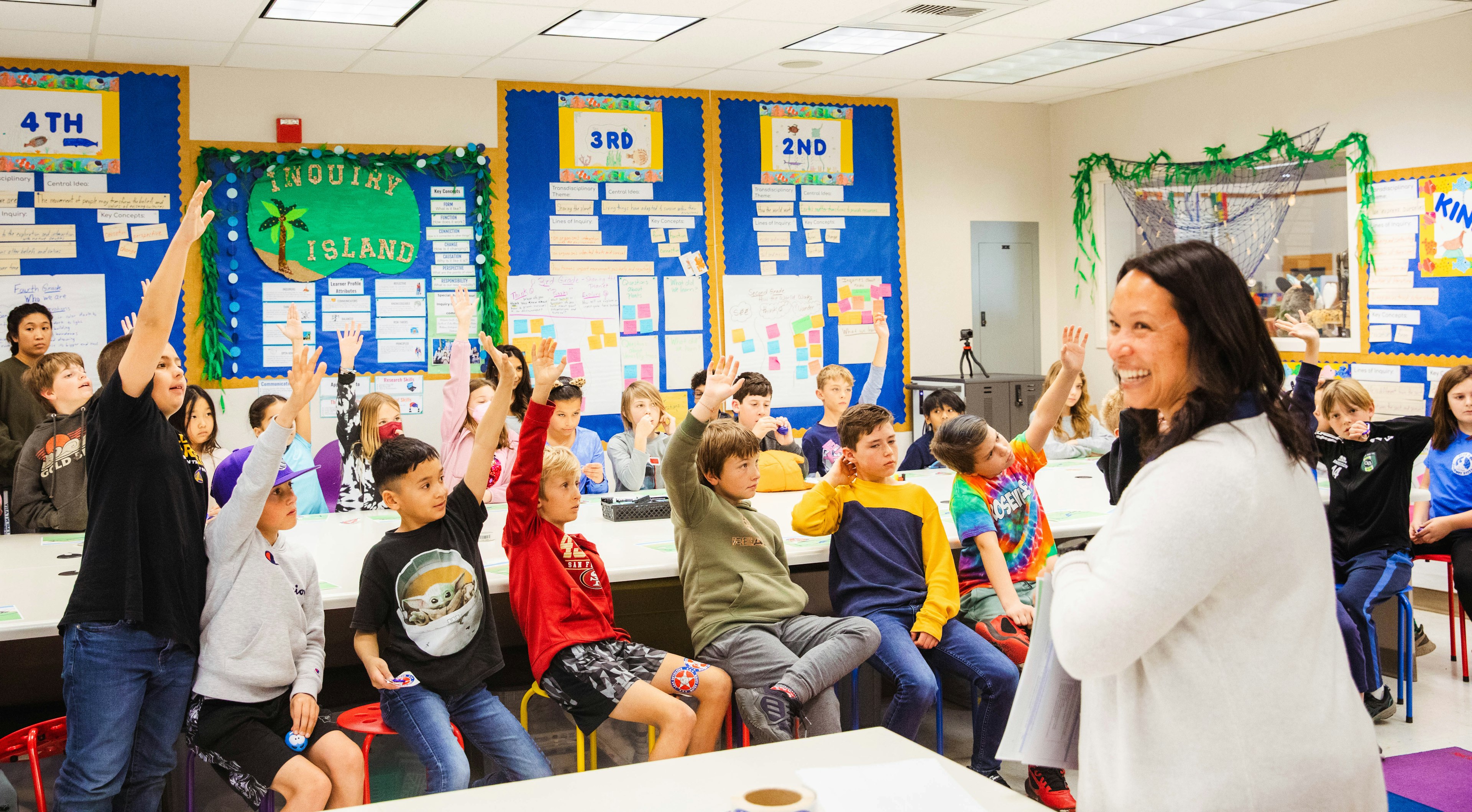 PCWA staff speaking with children in classroom picture 5