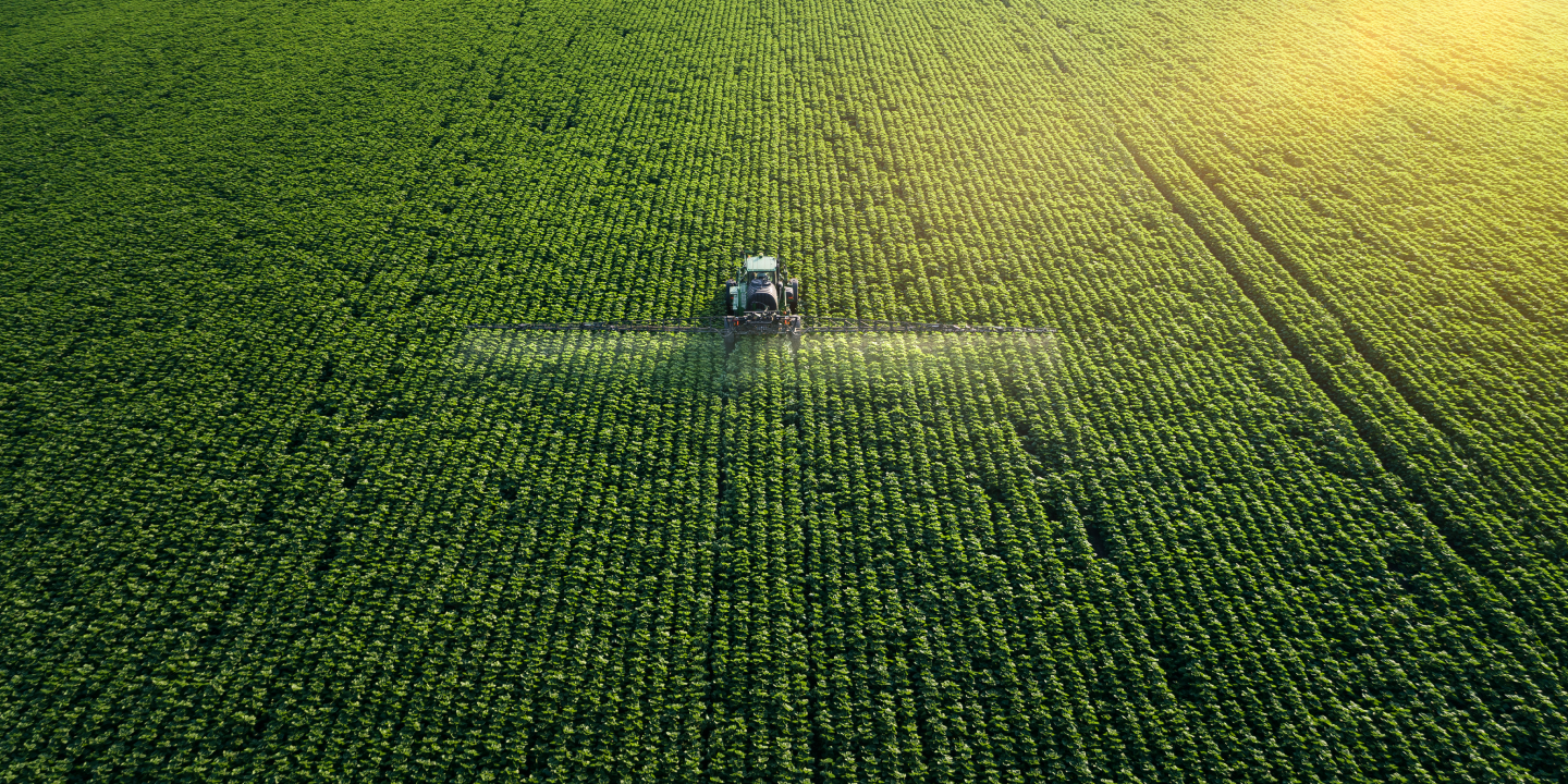 Farm field with a tractor
